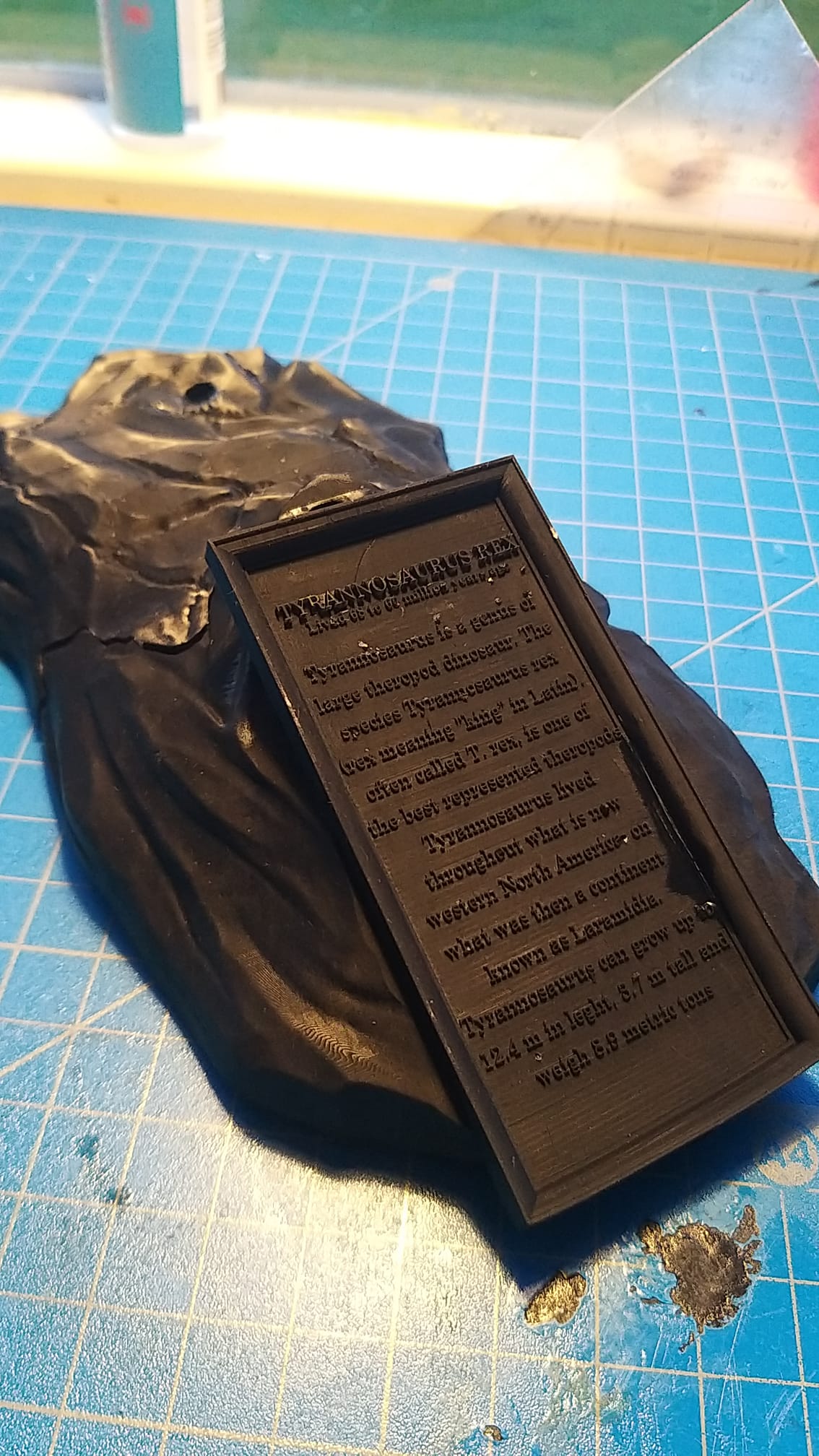 T-rex rock base with text