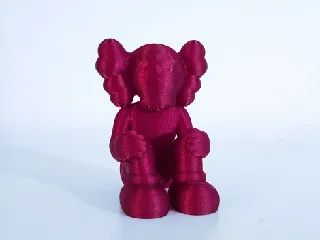 Kaws seated figure