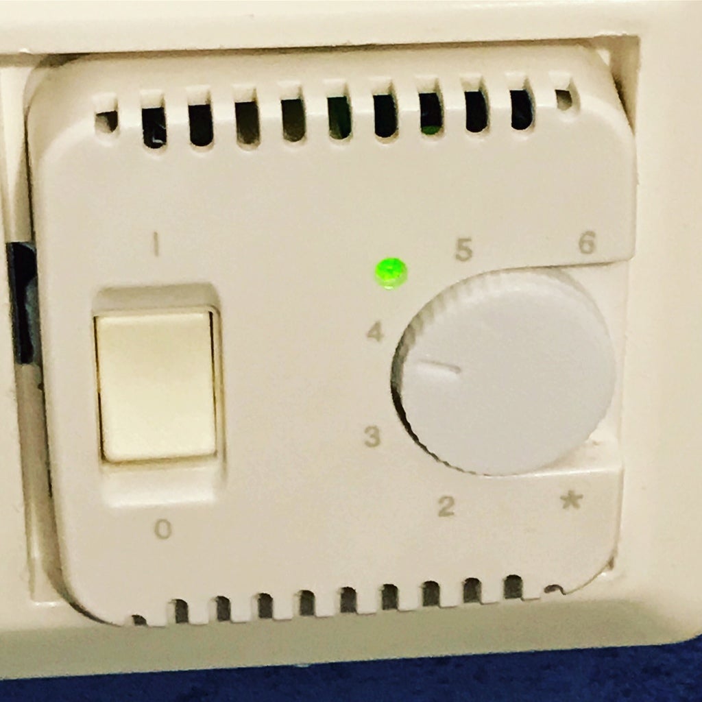 Knob for under floor heating thermostat