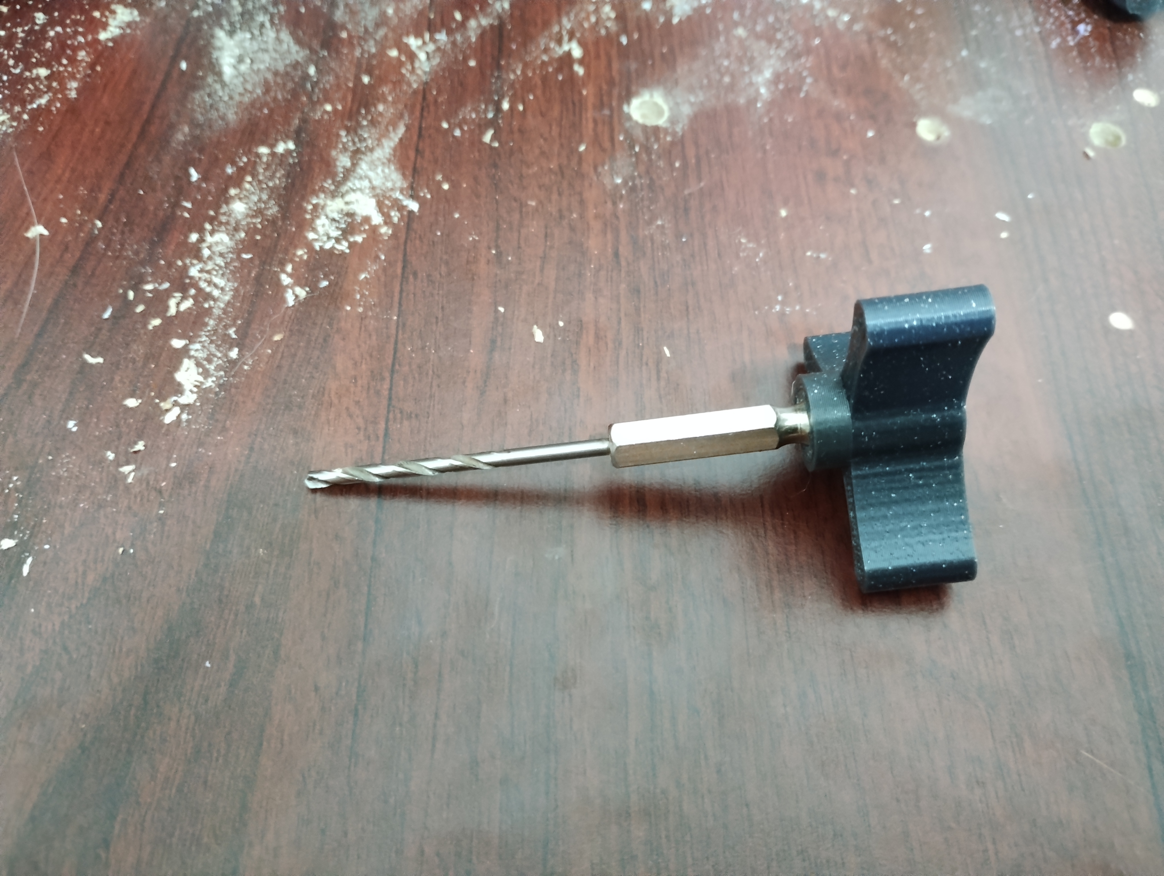 Handheld hex bit holder