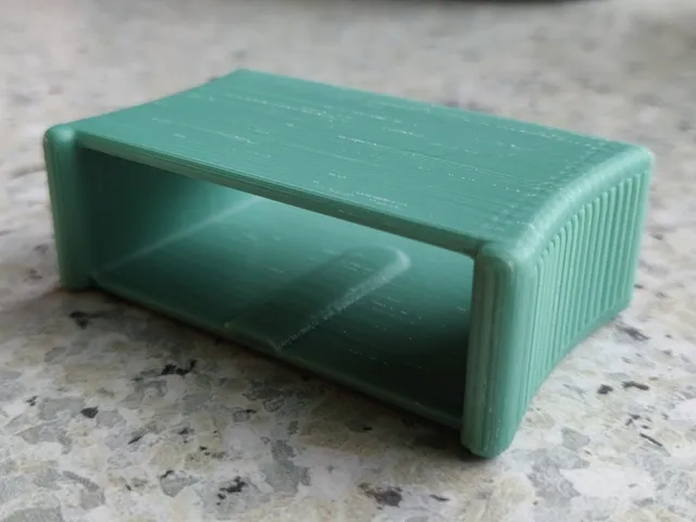 Tensioner / slider for flexible slat bed