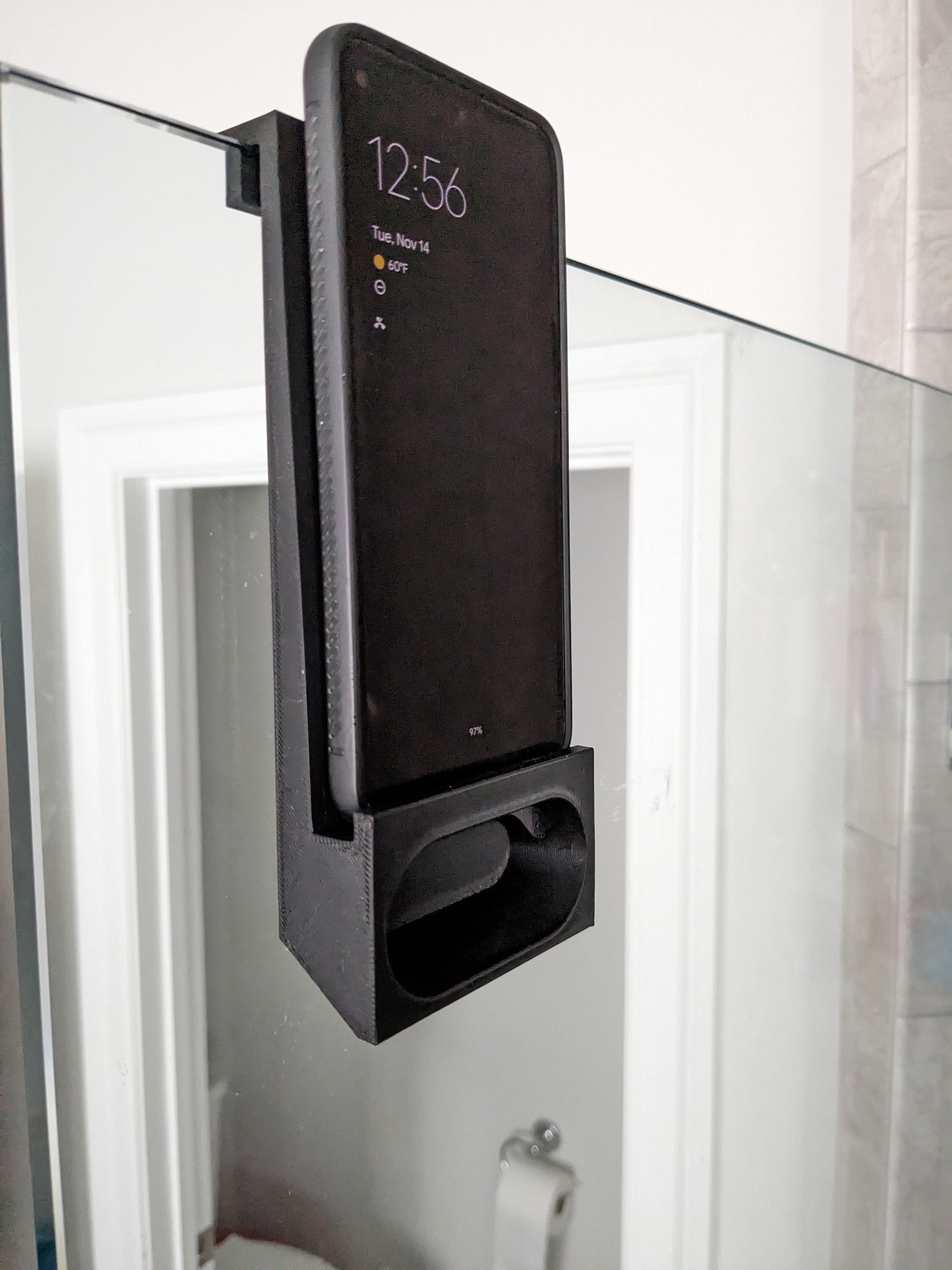 Mobile Phone mount for shower door with speaker openings