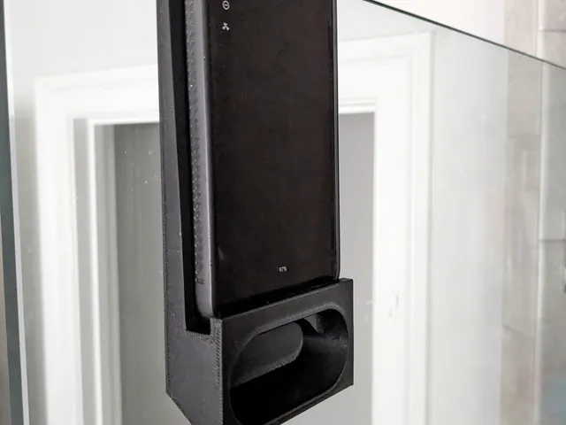 Mobile Phone mount for shower door with speaker openings