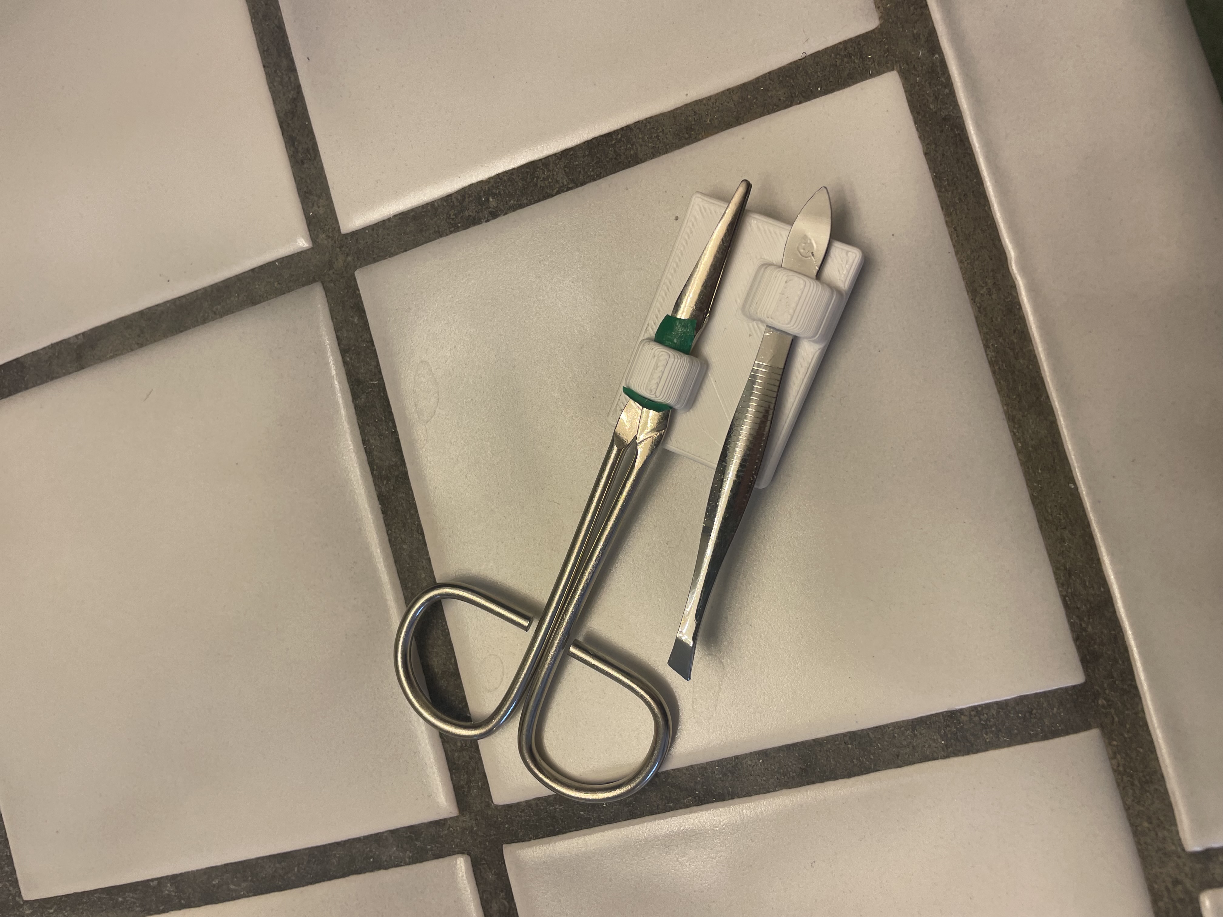 Scissor & Tweezer under Ammo Box Storage