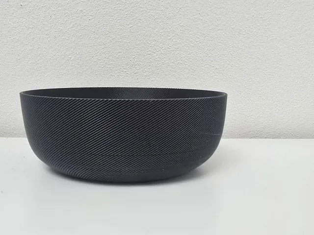 Sleek Black Ribbed Decorative Bowl