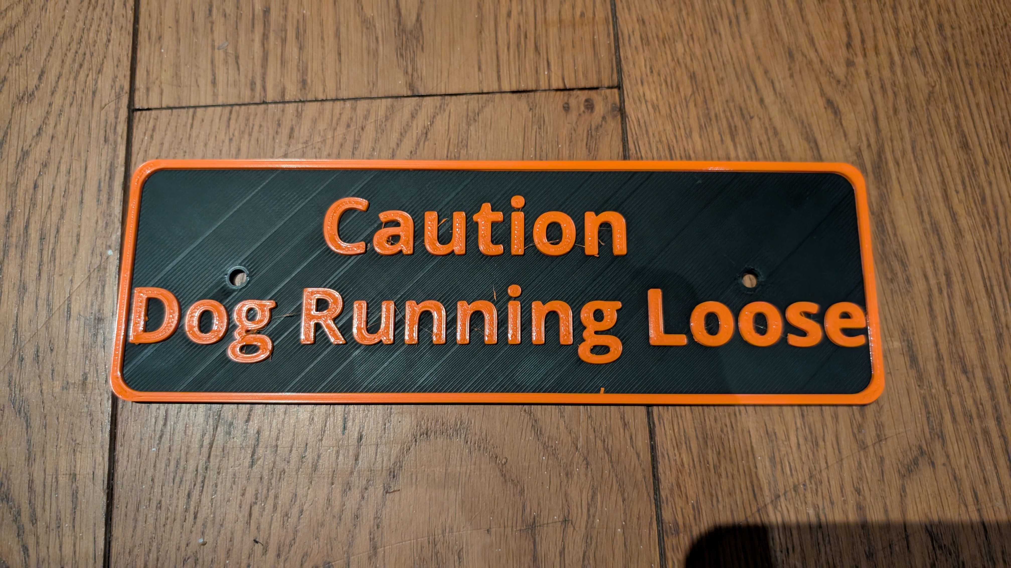 "Caution Dog Running Loose" sign