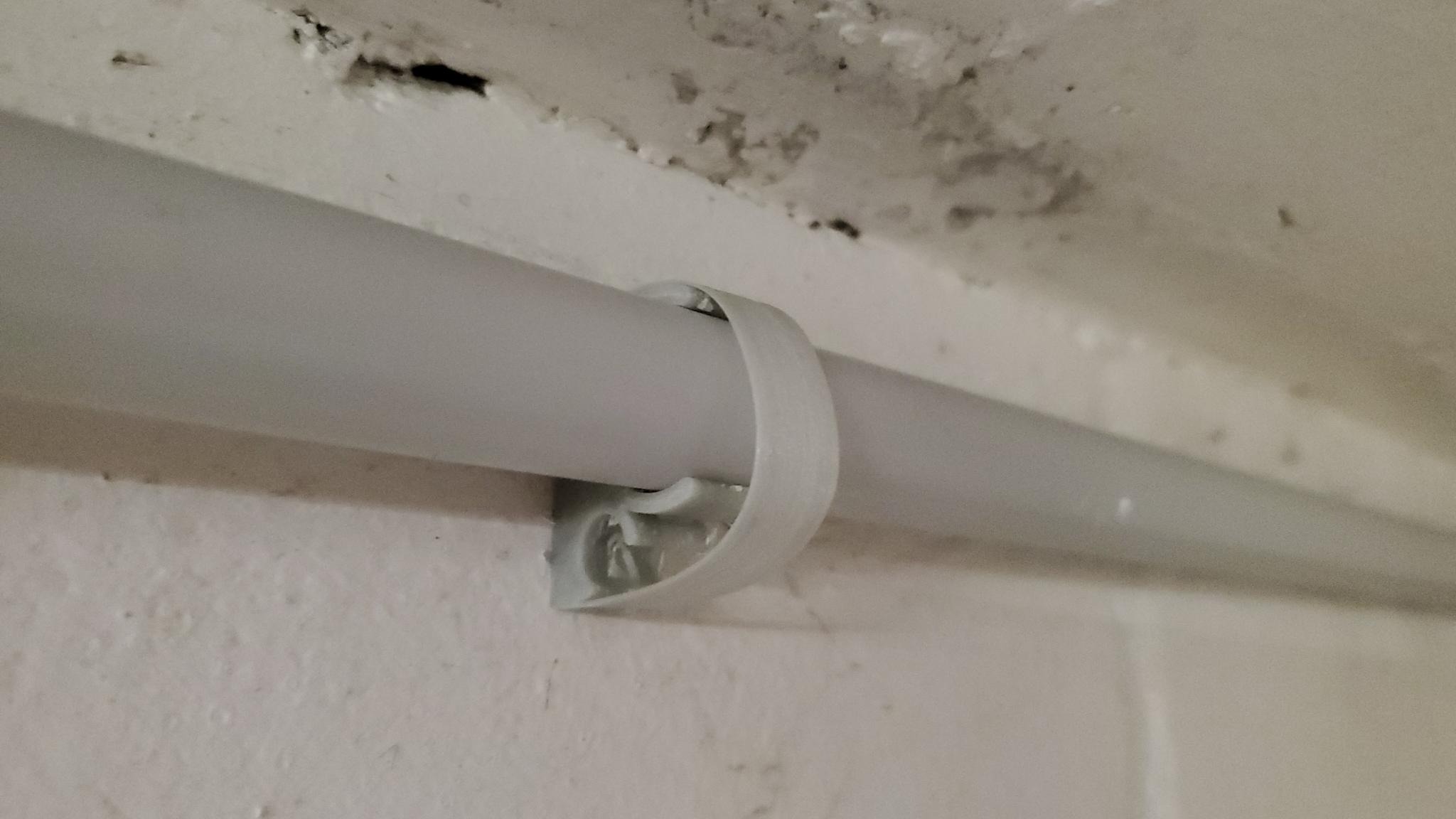 Conduit holder for 20mm PVC Pipe with place for 8mm cable underneath by