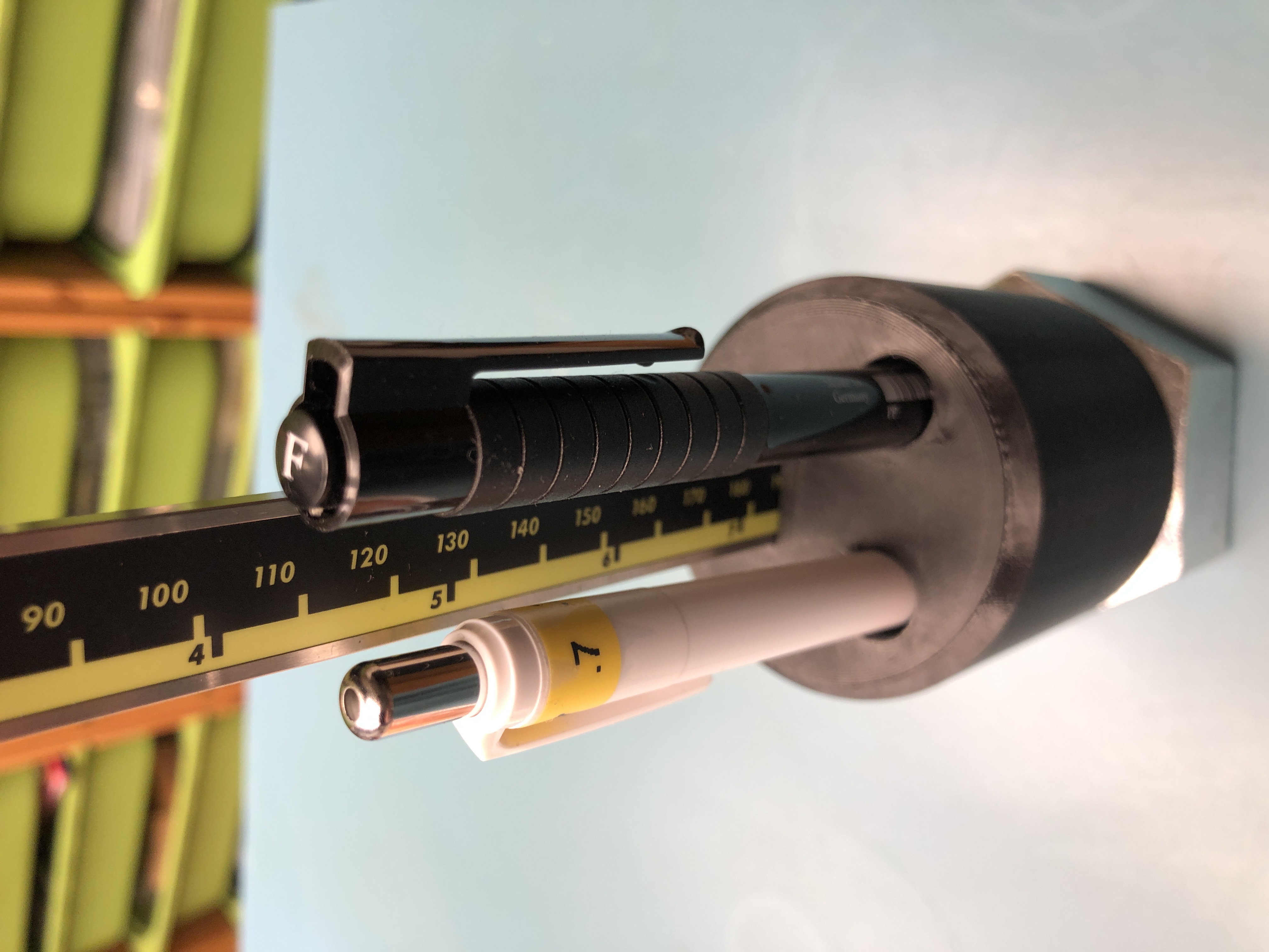 A mobile pen/pencil/caliper holder with M39 nut base for stability