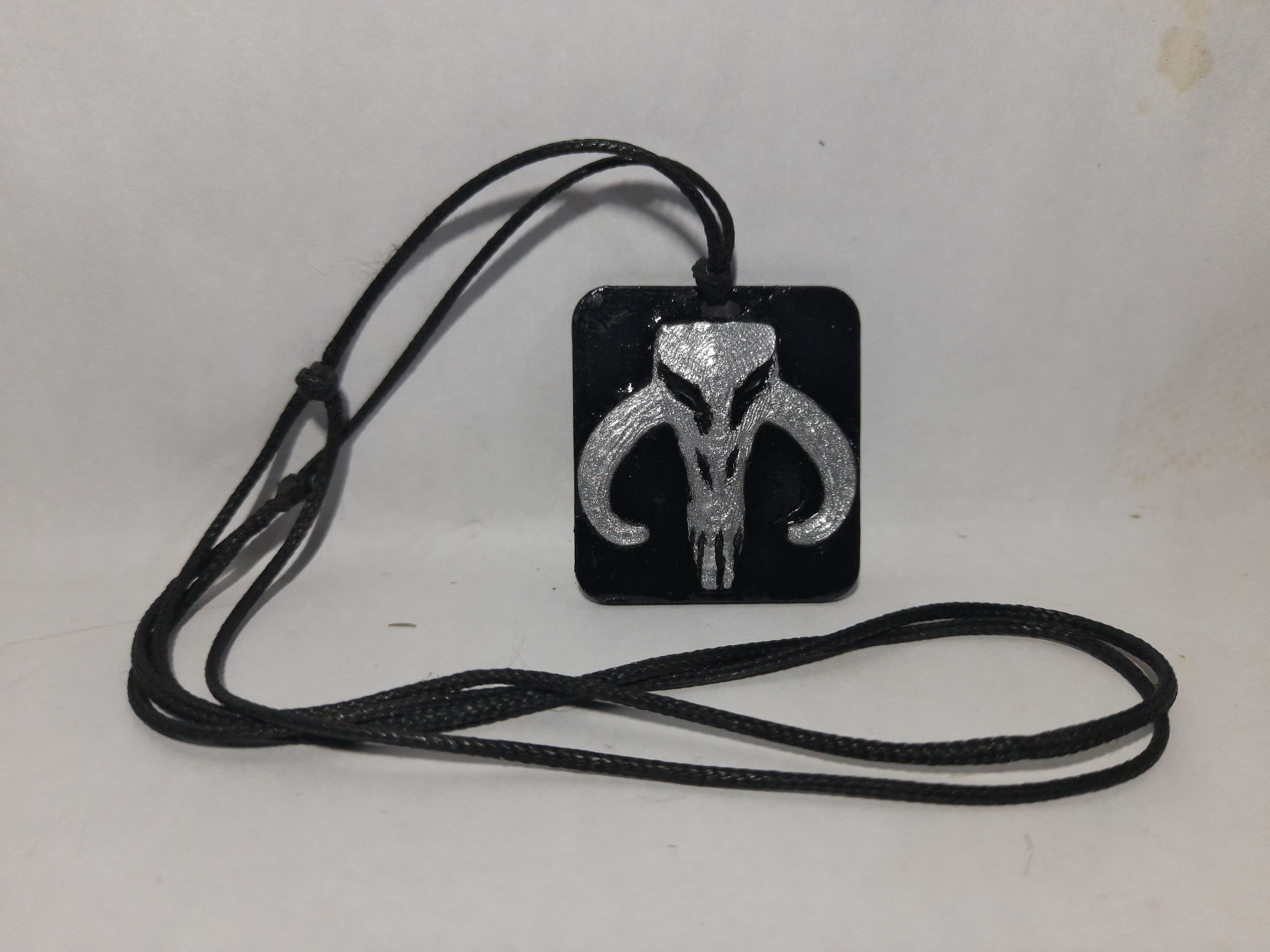 Llavero y colgante de Mythosaurio