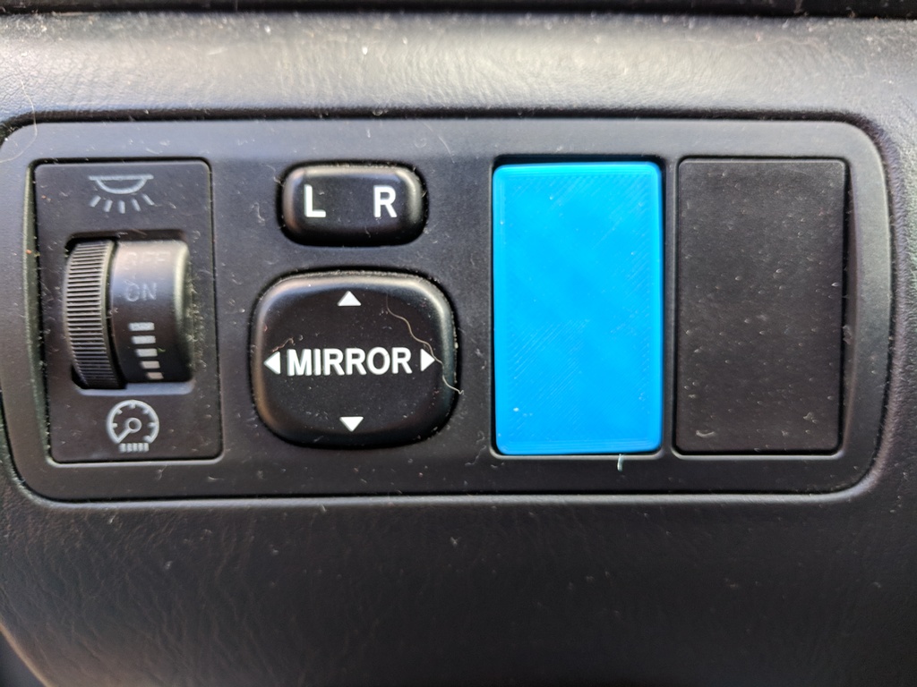 2003 Corolla Accessory button cap
