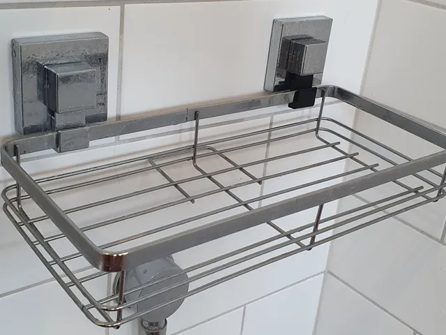 Shower tray hanger