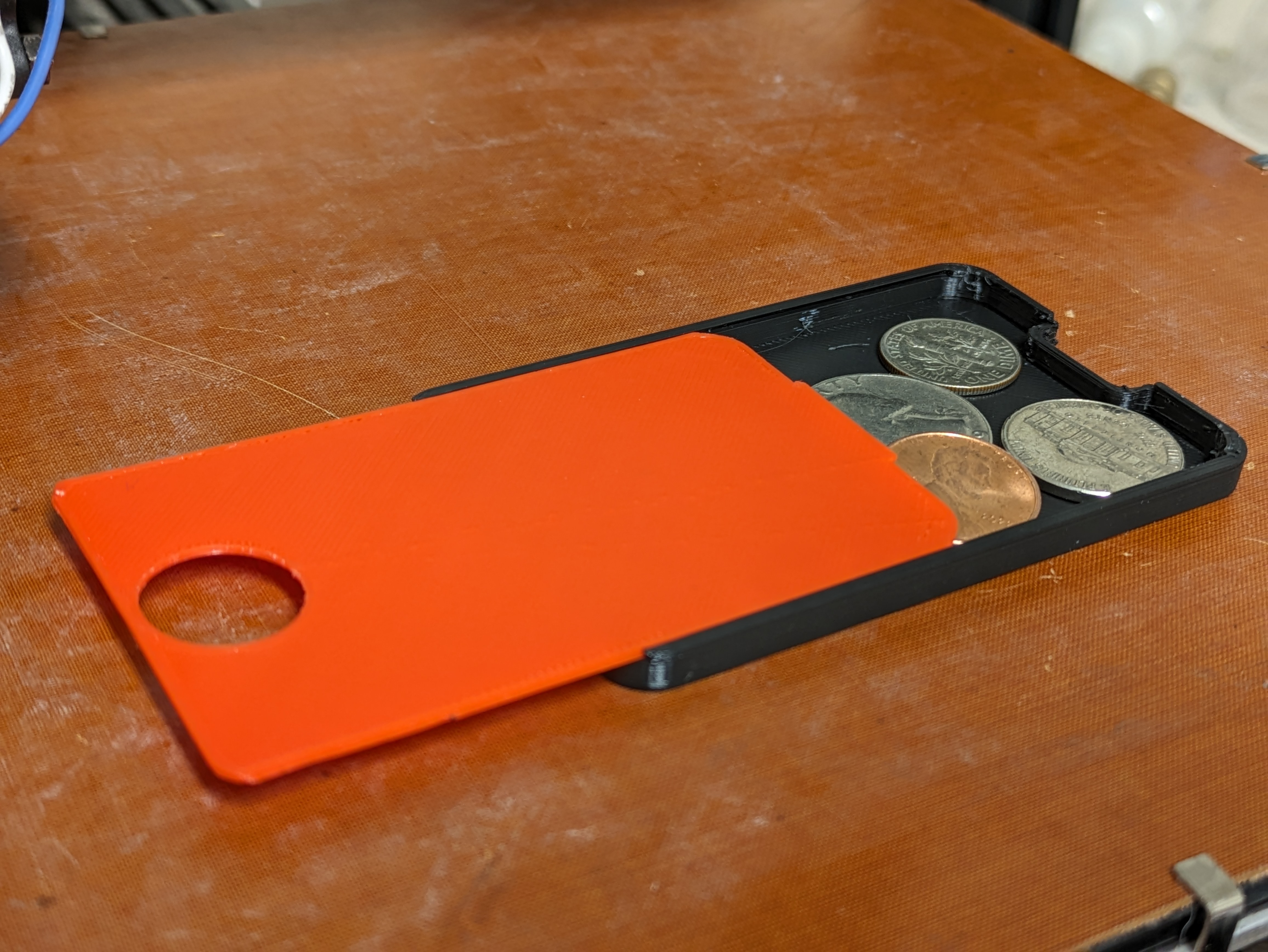 Ridge wallet coin holder
