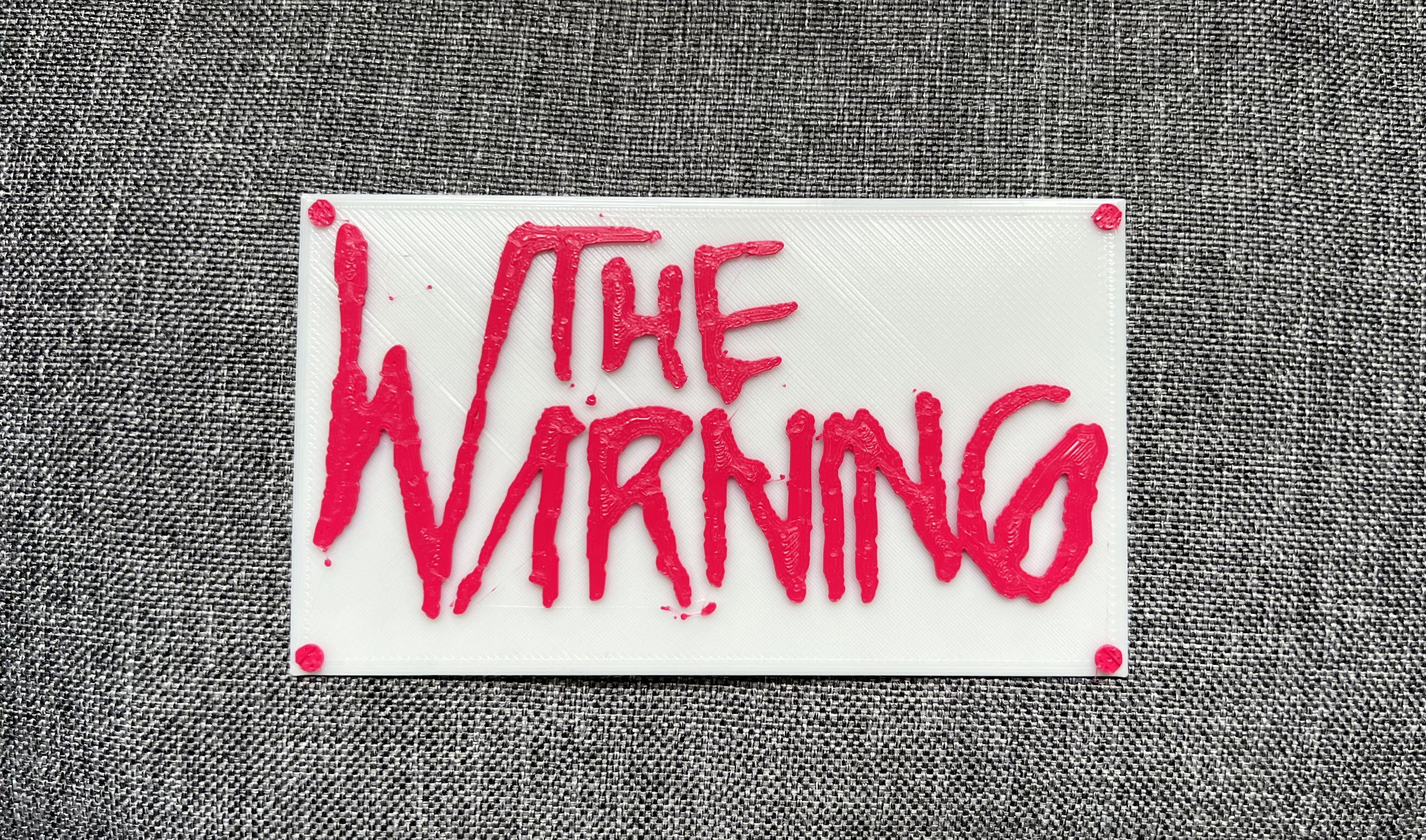 The Warning Logo Plate