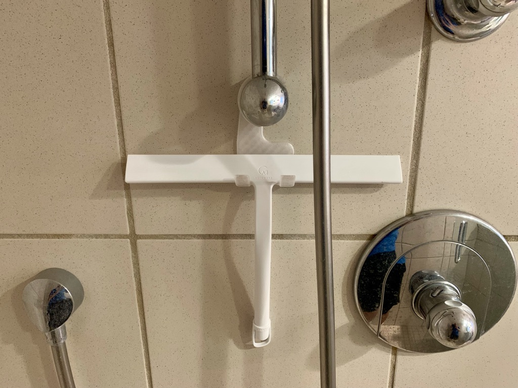 Shower Squeegee holder for Hansgrohe hand shower slide bar.
