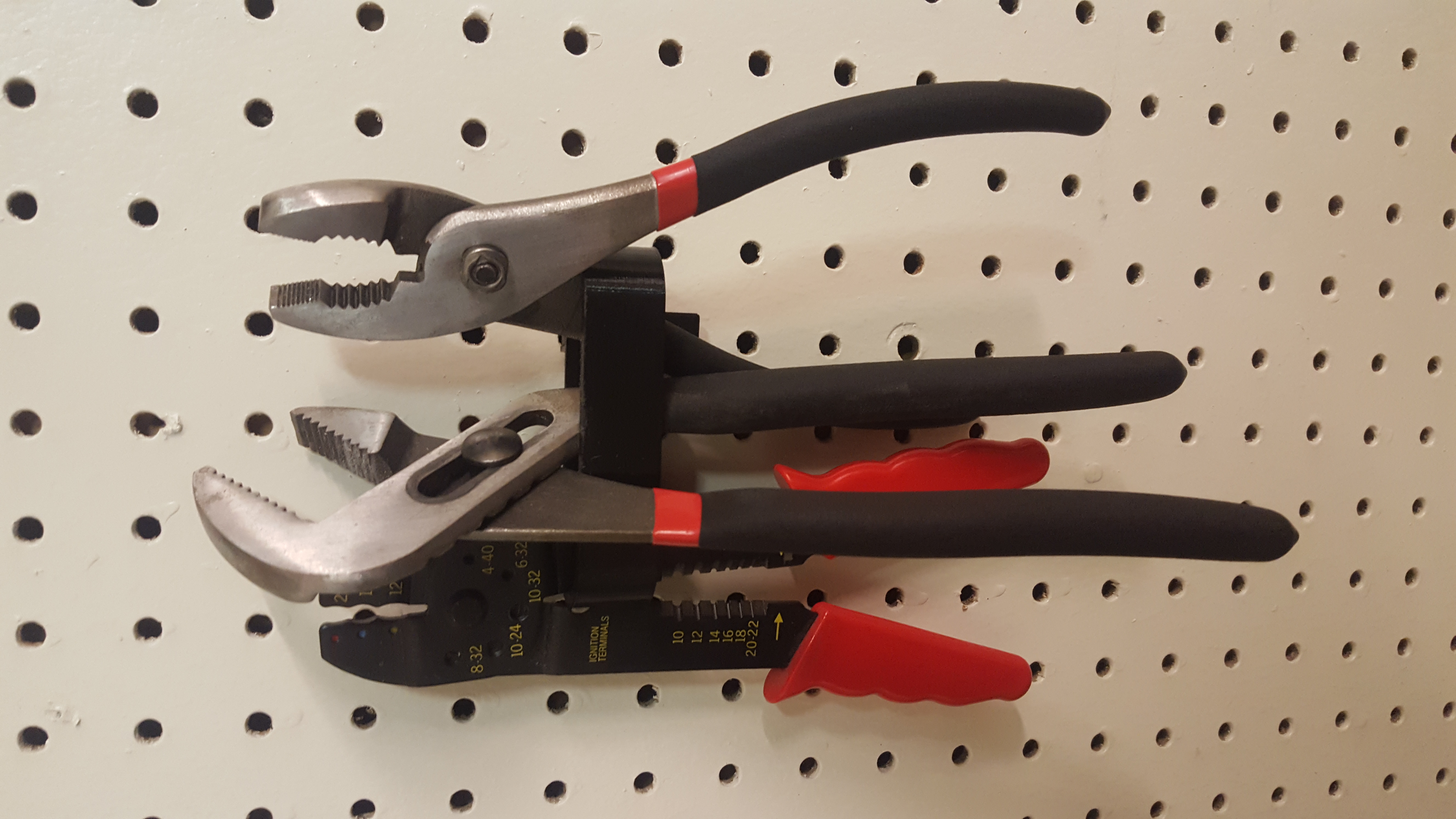 Minimalistic pliers holder for the Universal Peg Board System 3D model thumbnail