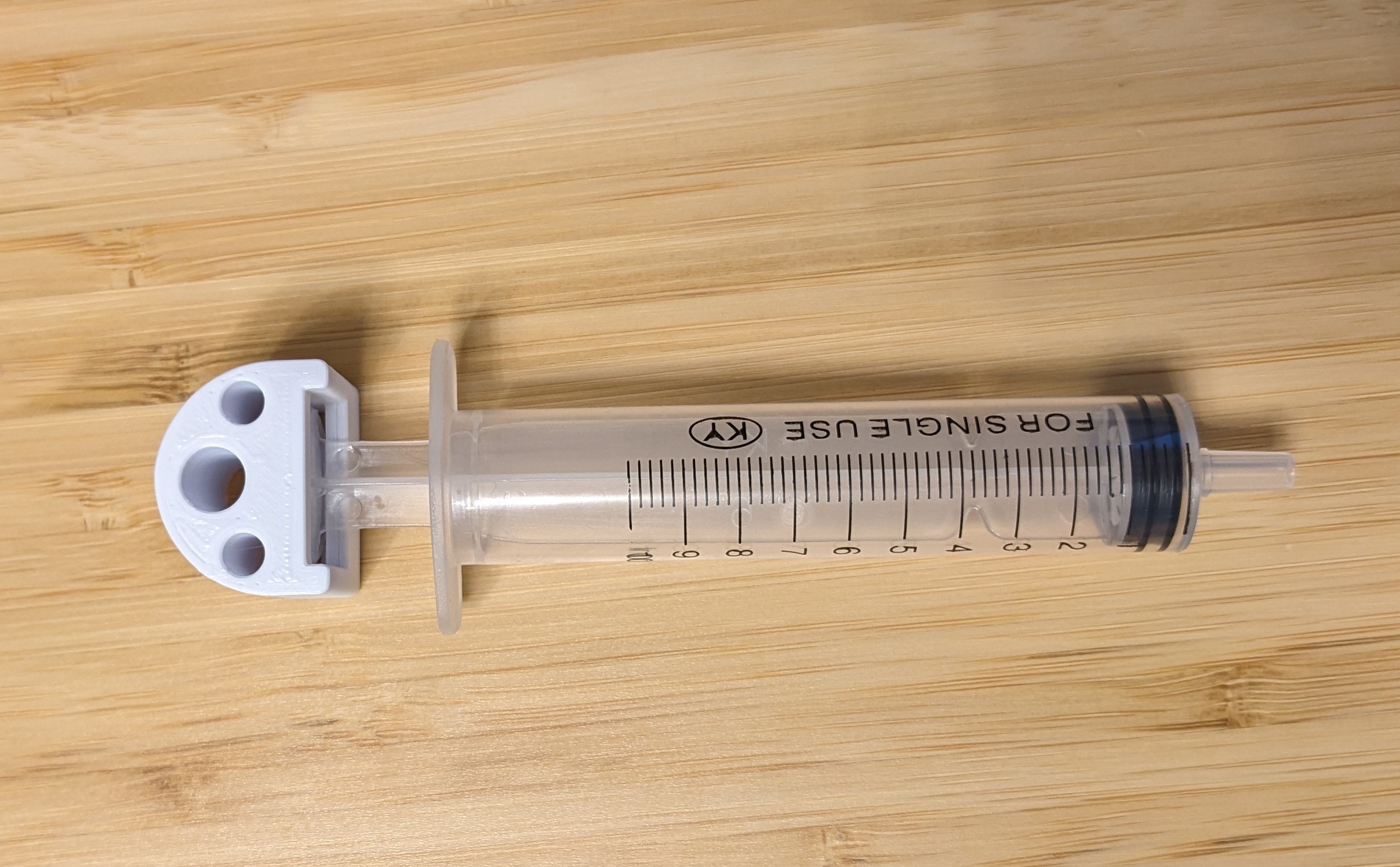 Syringe adapter