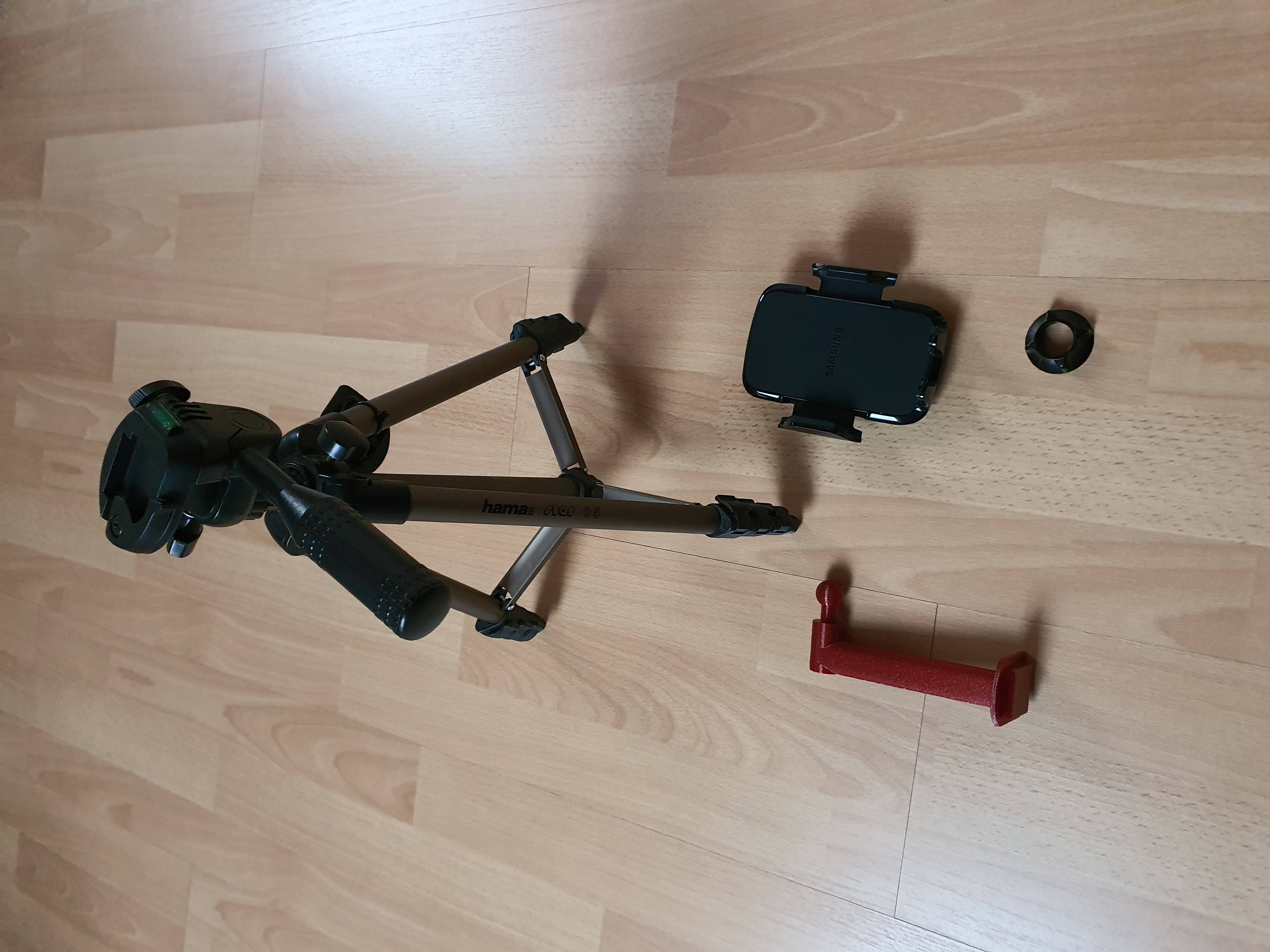 Verbindungsstück zwischen Hama Star05 Stativ und Samsung Handyhalterung