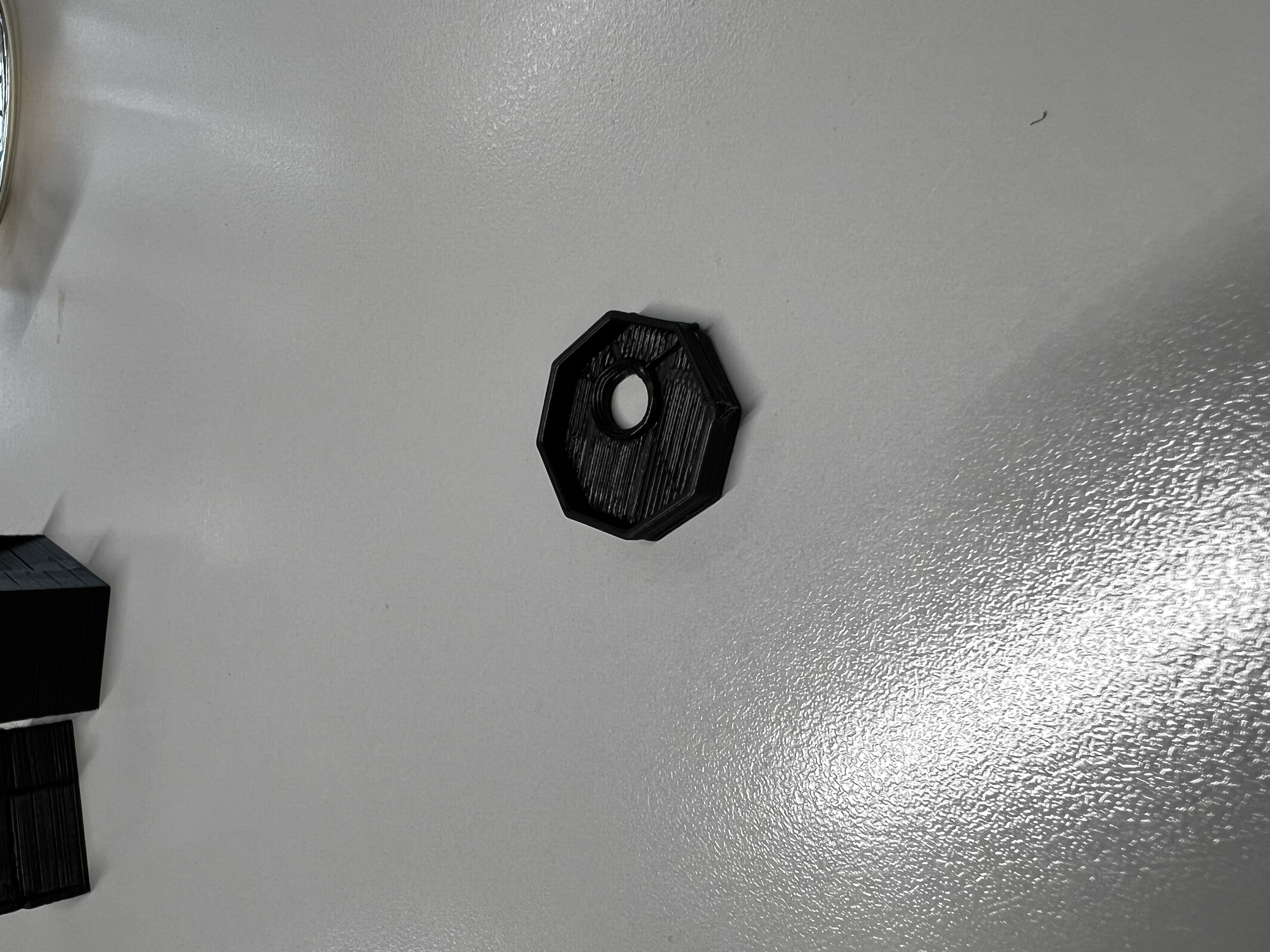 Picture frame adjuster