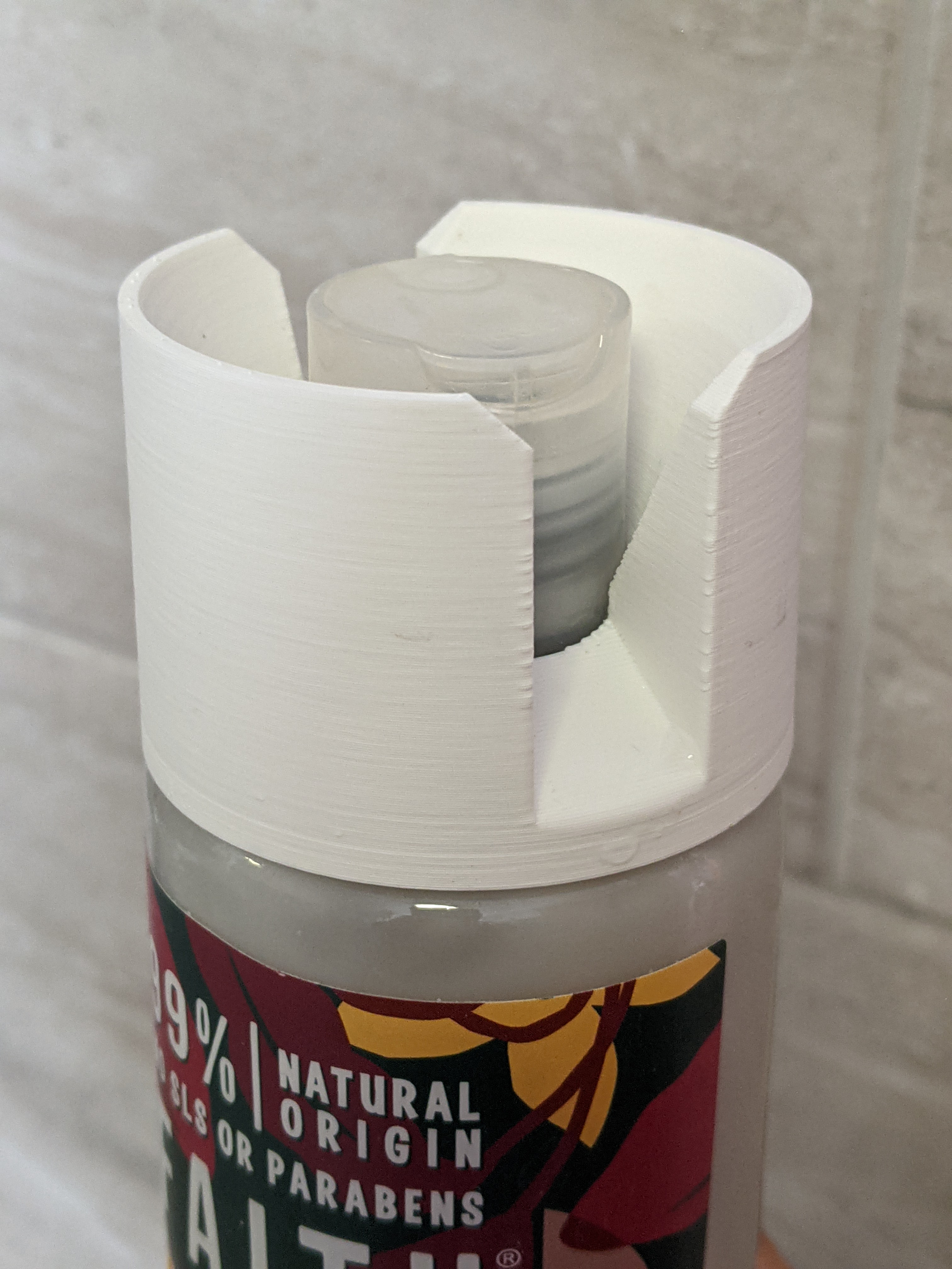 Stand for shampoo bottle