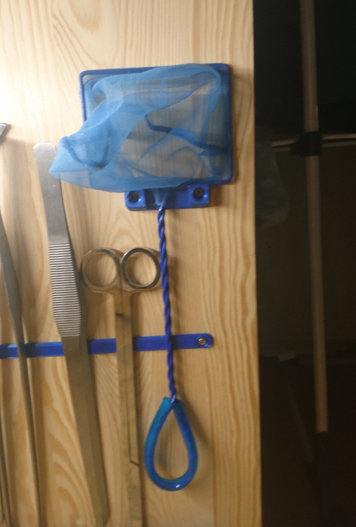Fish net holder