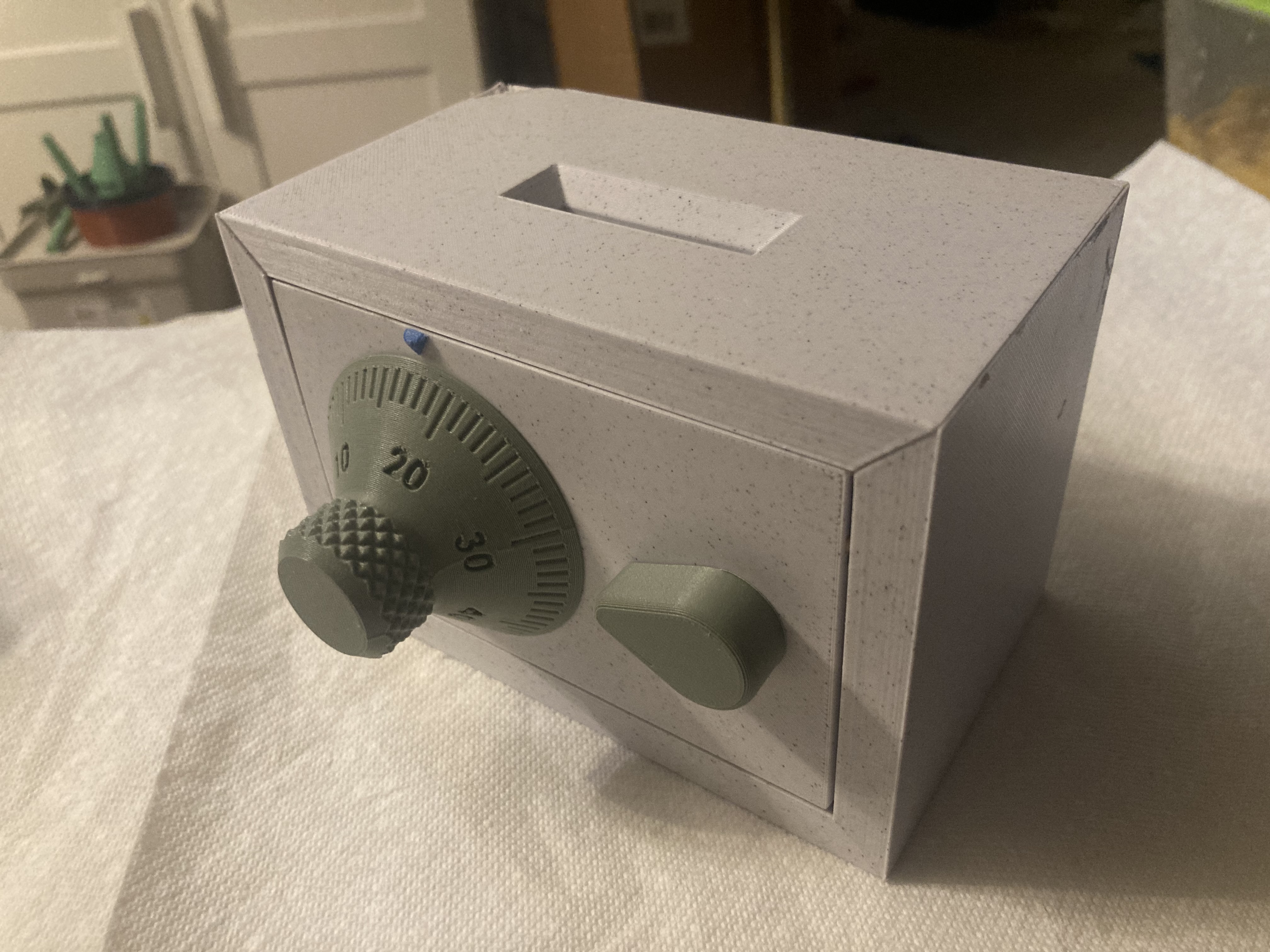 Piggy bank safe with secret compartment