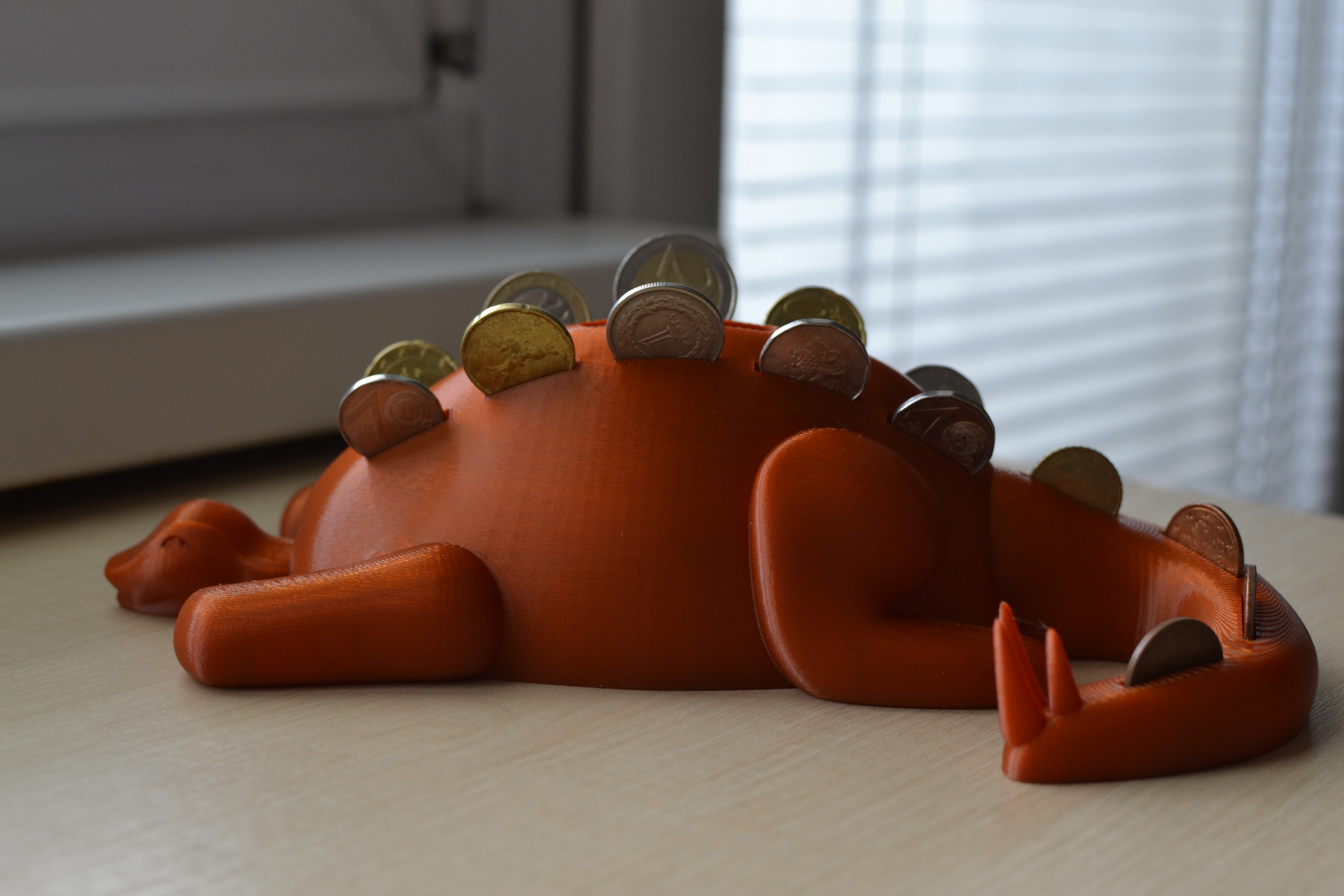 Stegosaurus piggy bank