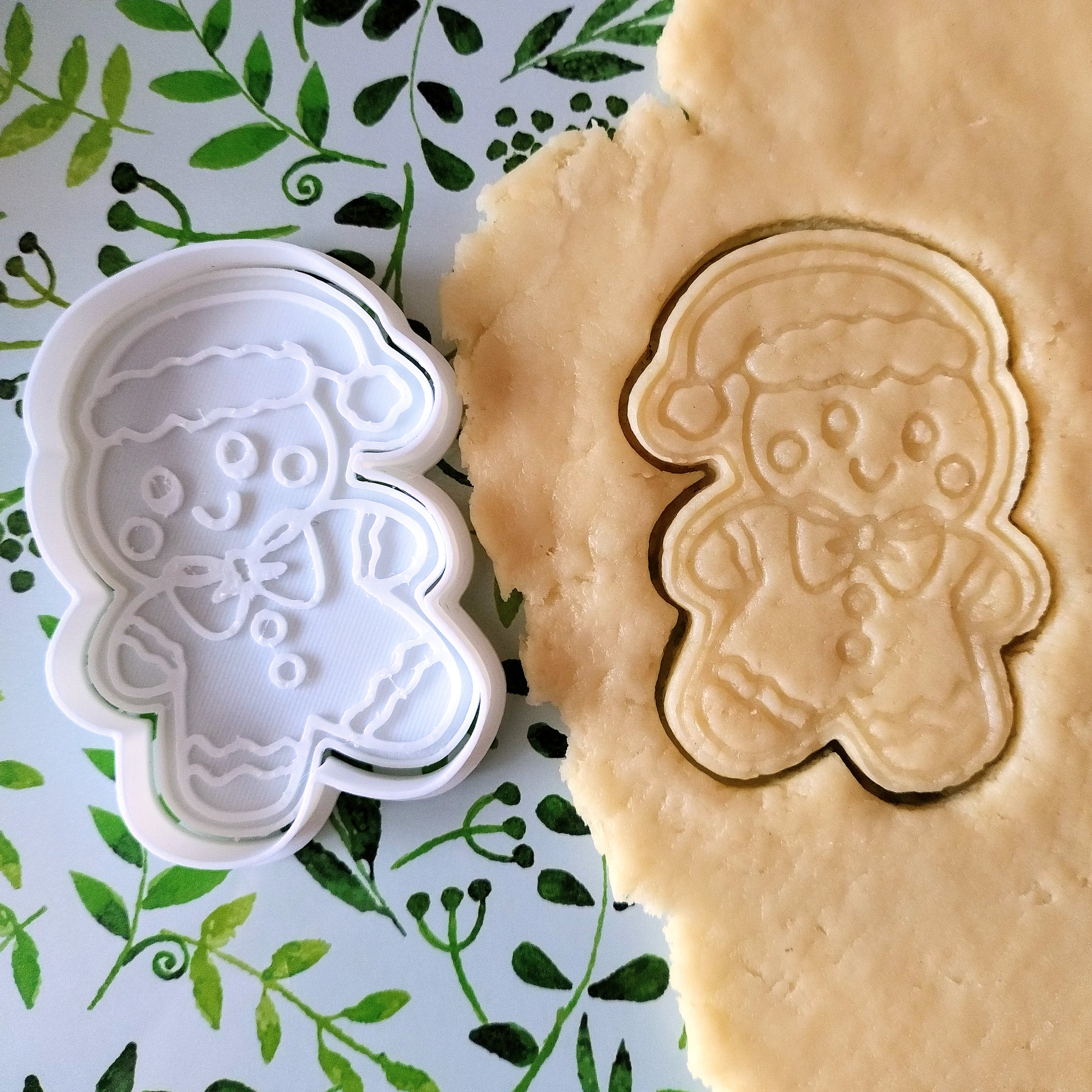 Christmas cookie cutter and stamp gingerbread man with santa hat