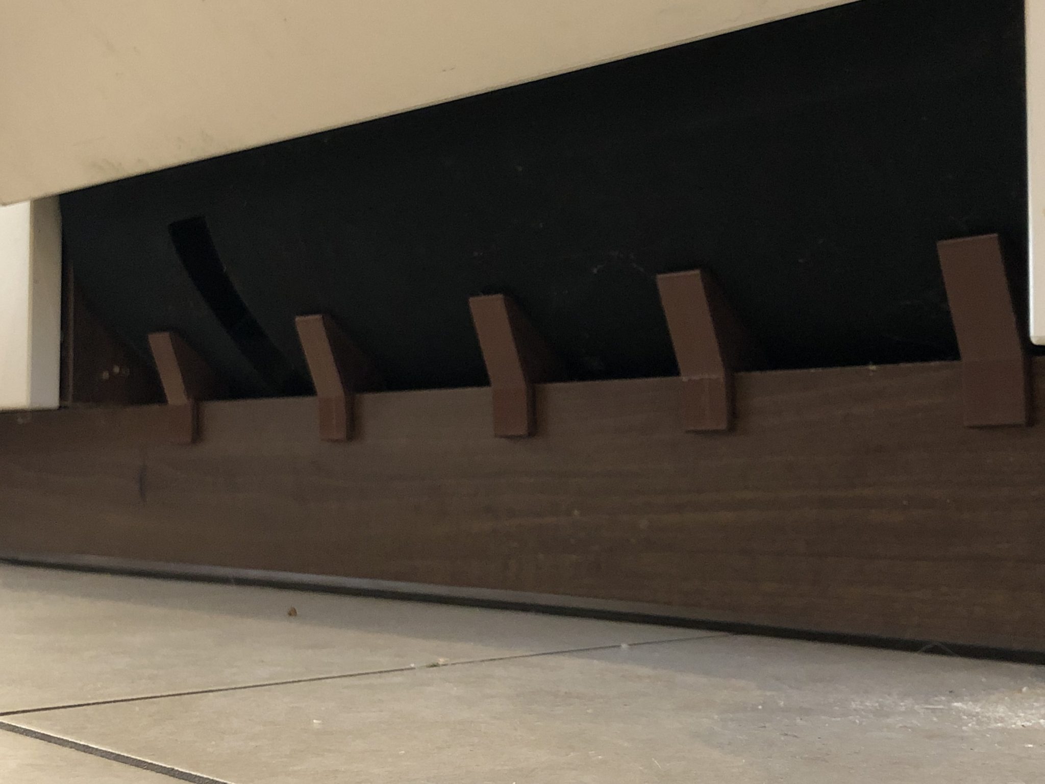 Holder for dishwasher drapery