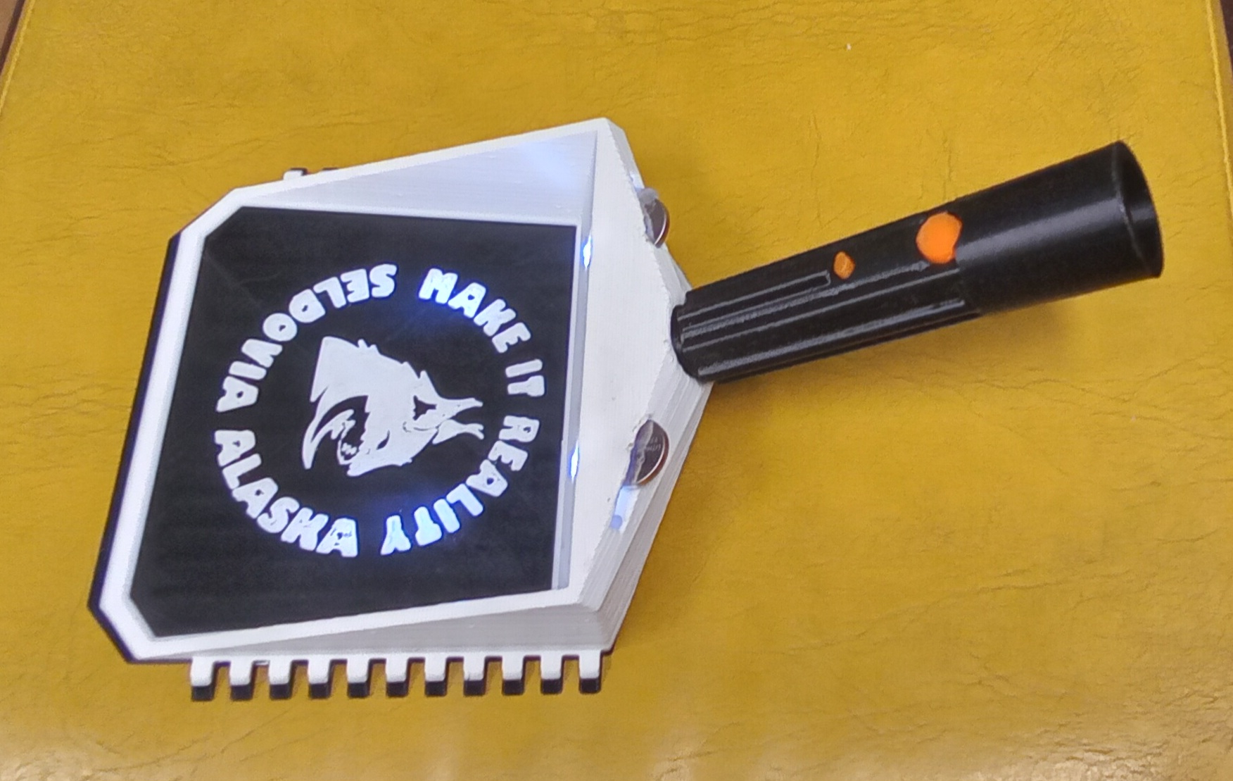 The Lynx. Lighted, ice-scraping window shovel, from Alaska.