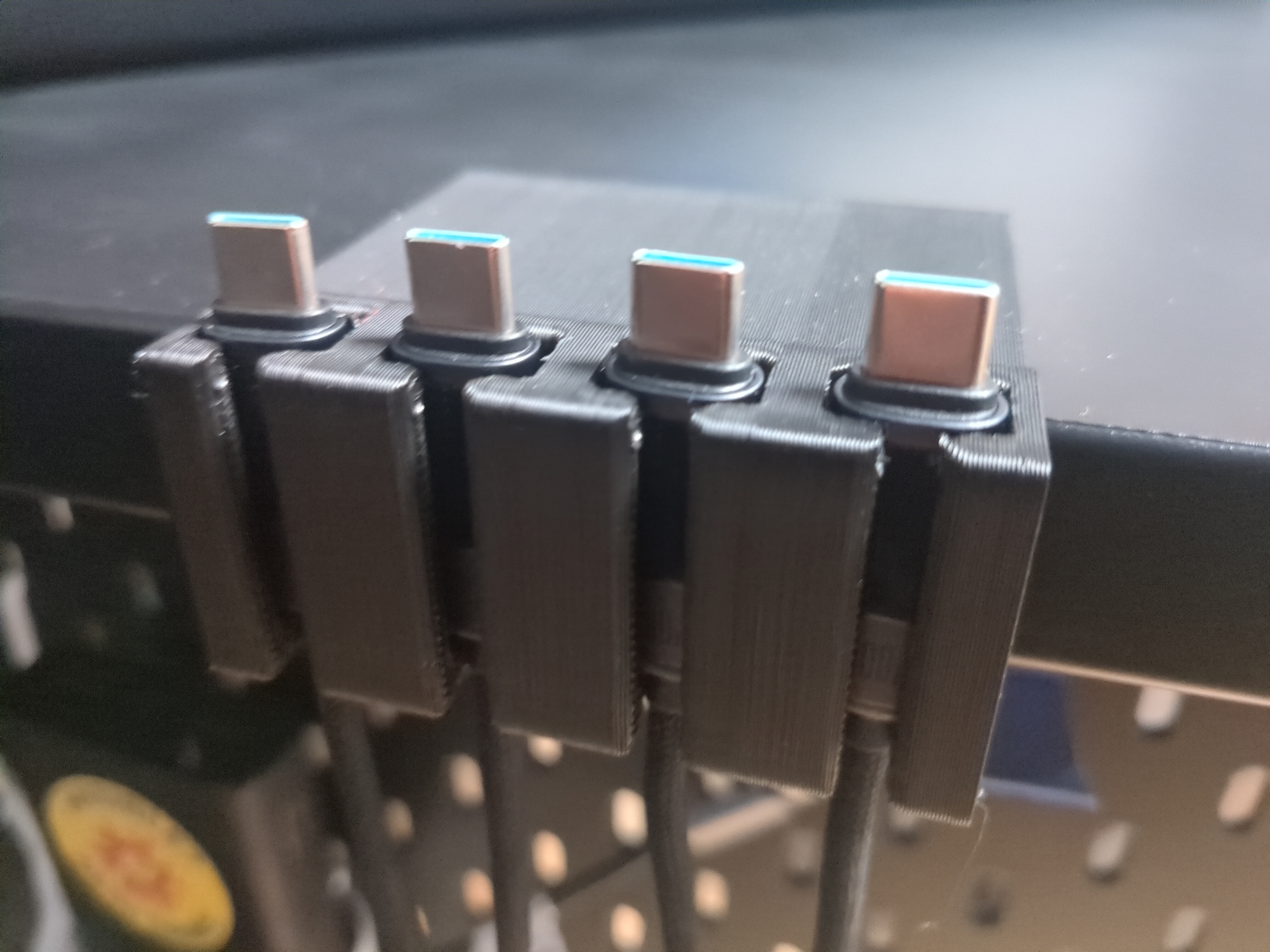 Desk edge cable holder