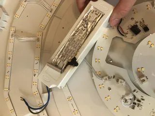 Adapter for larger power supply in LED lamp