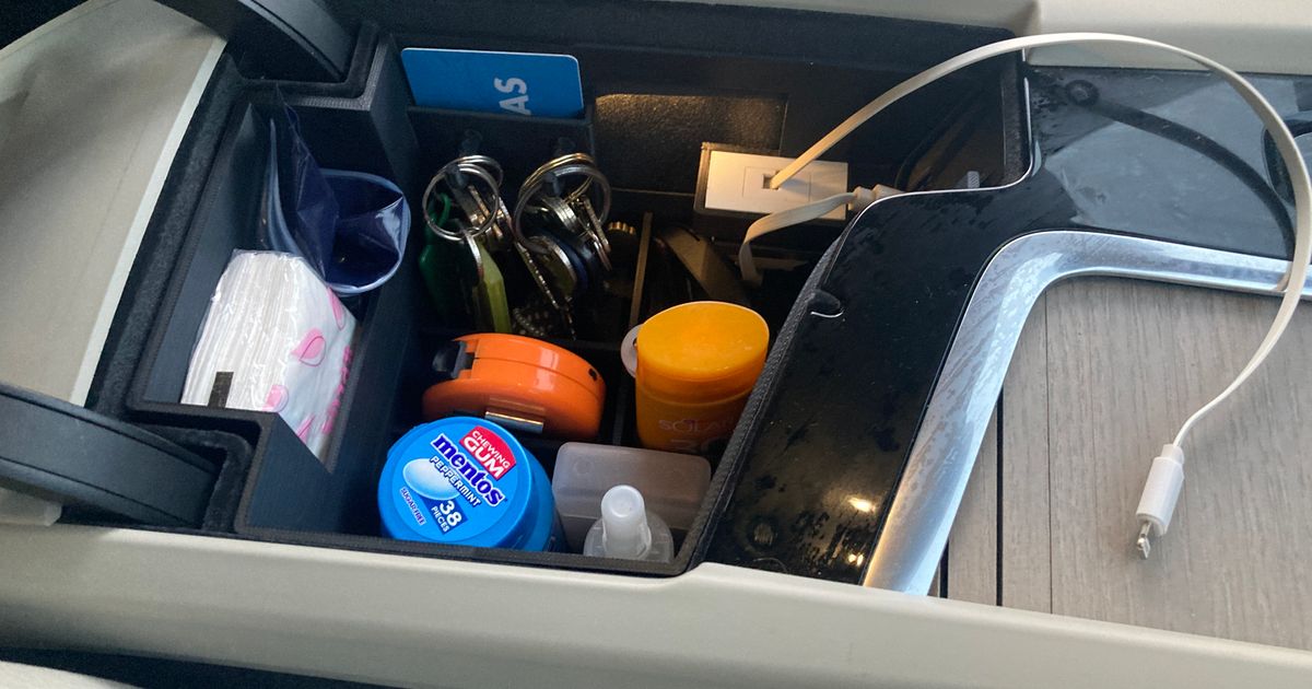 Volvo XC60 Console Organizer with slot for retractable USB cable by