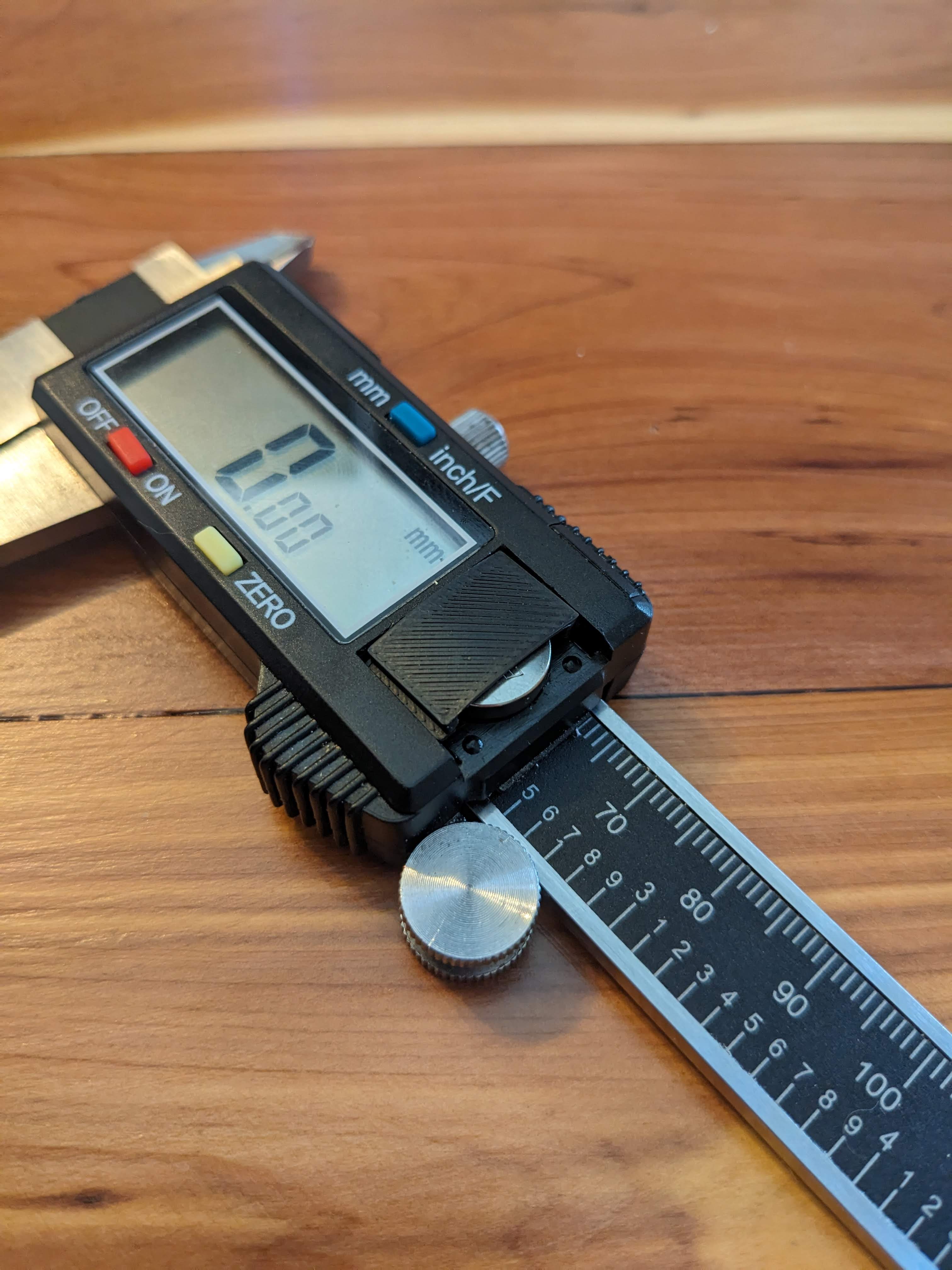 Neiko Caliper Battery Cover by Heath Harris Download free STL model