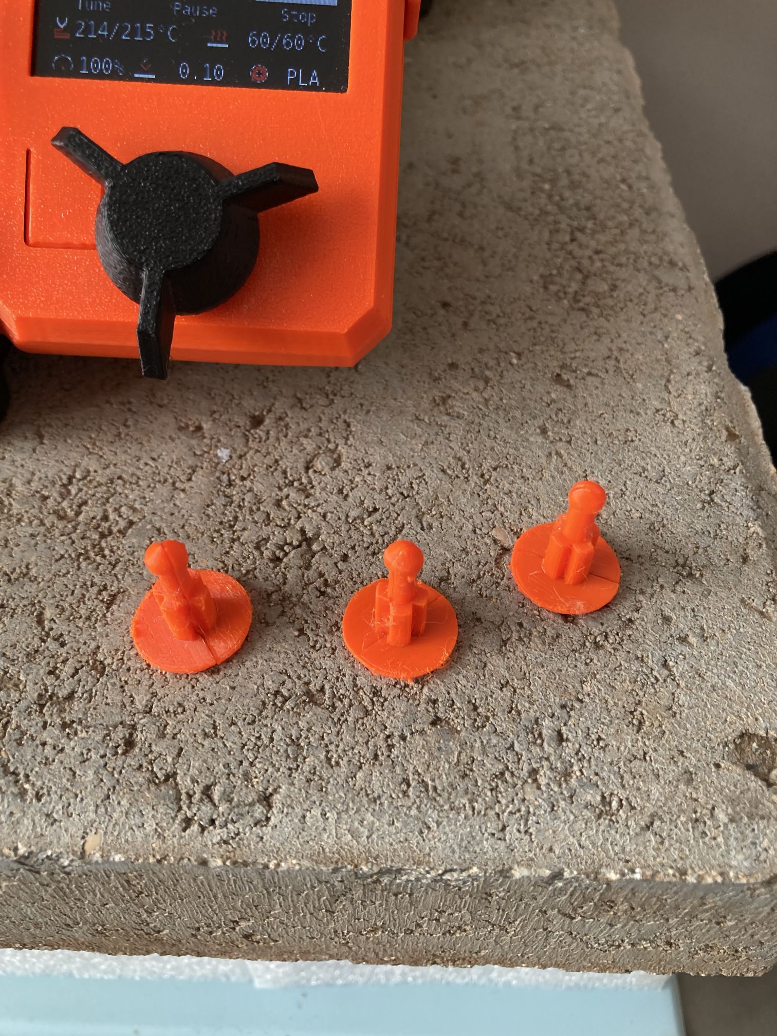 Fastener plug for a Subaru car.