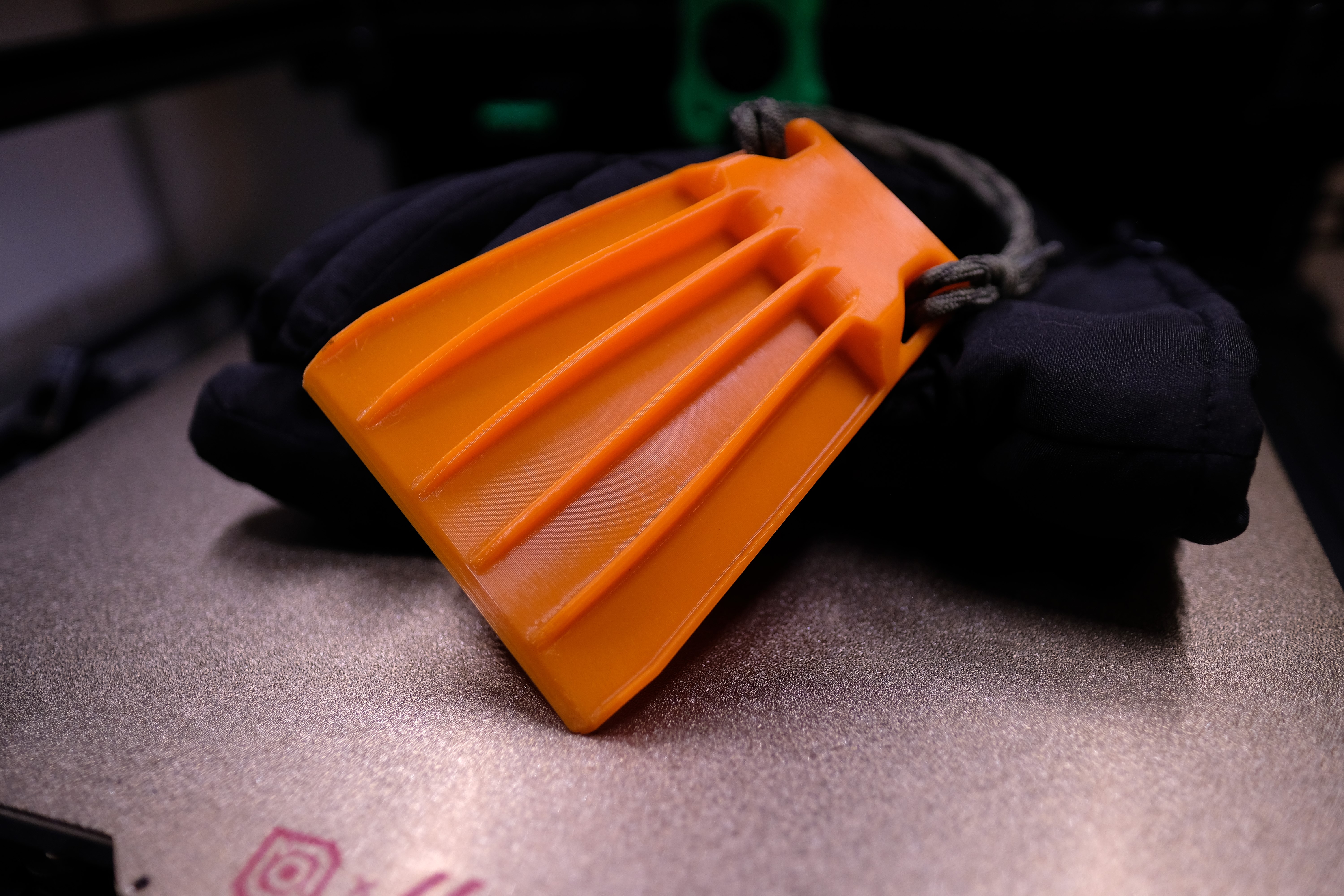 Curved Ice Scraper with engineered compliance
