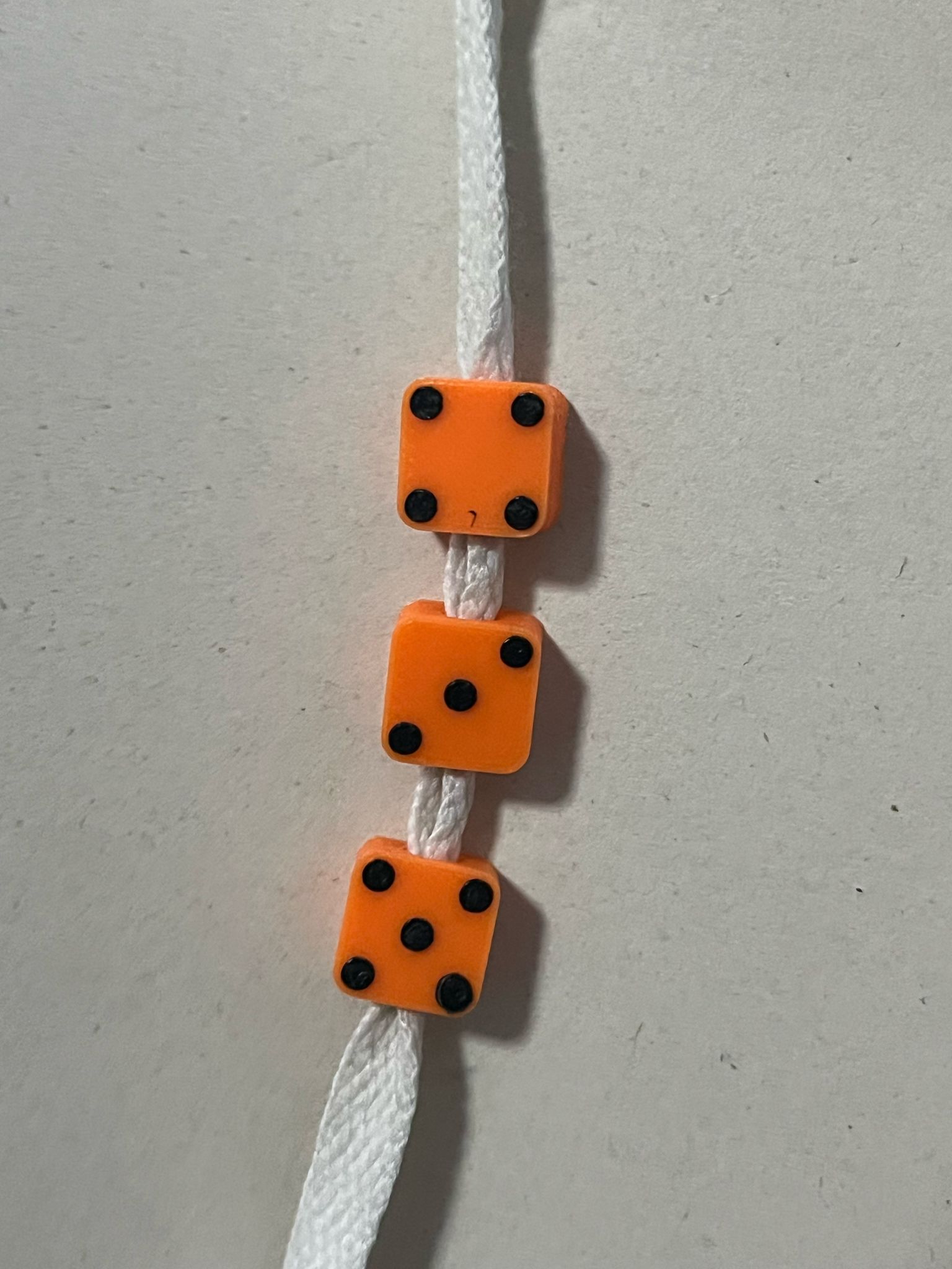 Dice-Inspired Shoe Lace Beads
