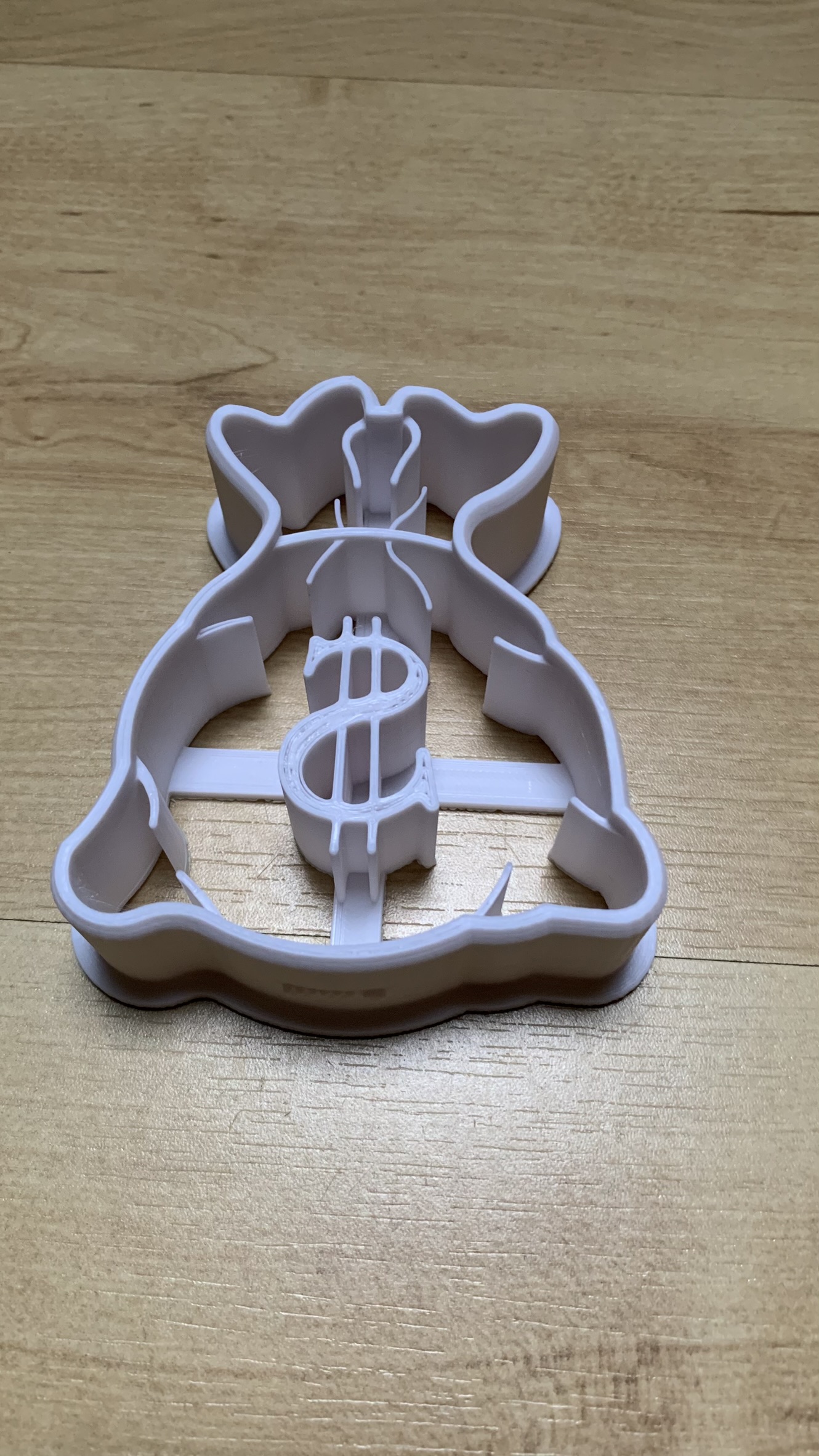 cookie cutter from money bag