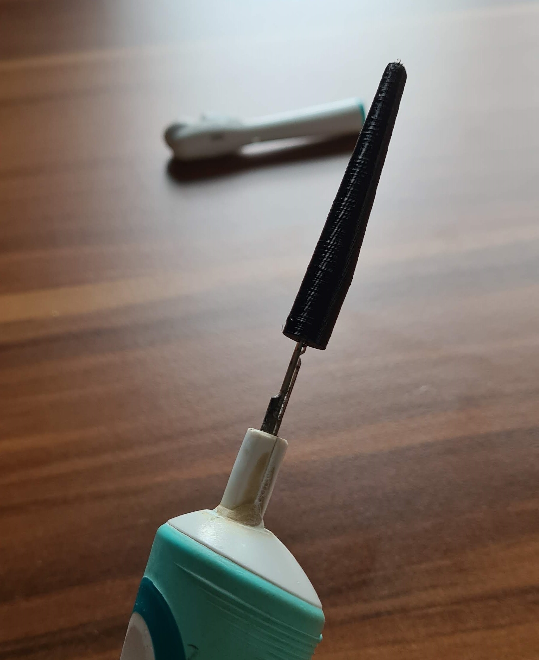 Oral-B electric toothbrush flower pollinator attachment