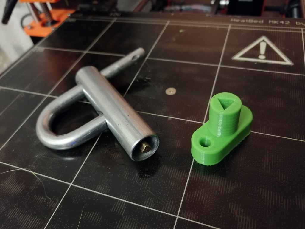 Key for triangle-locked padlock