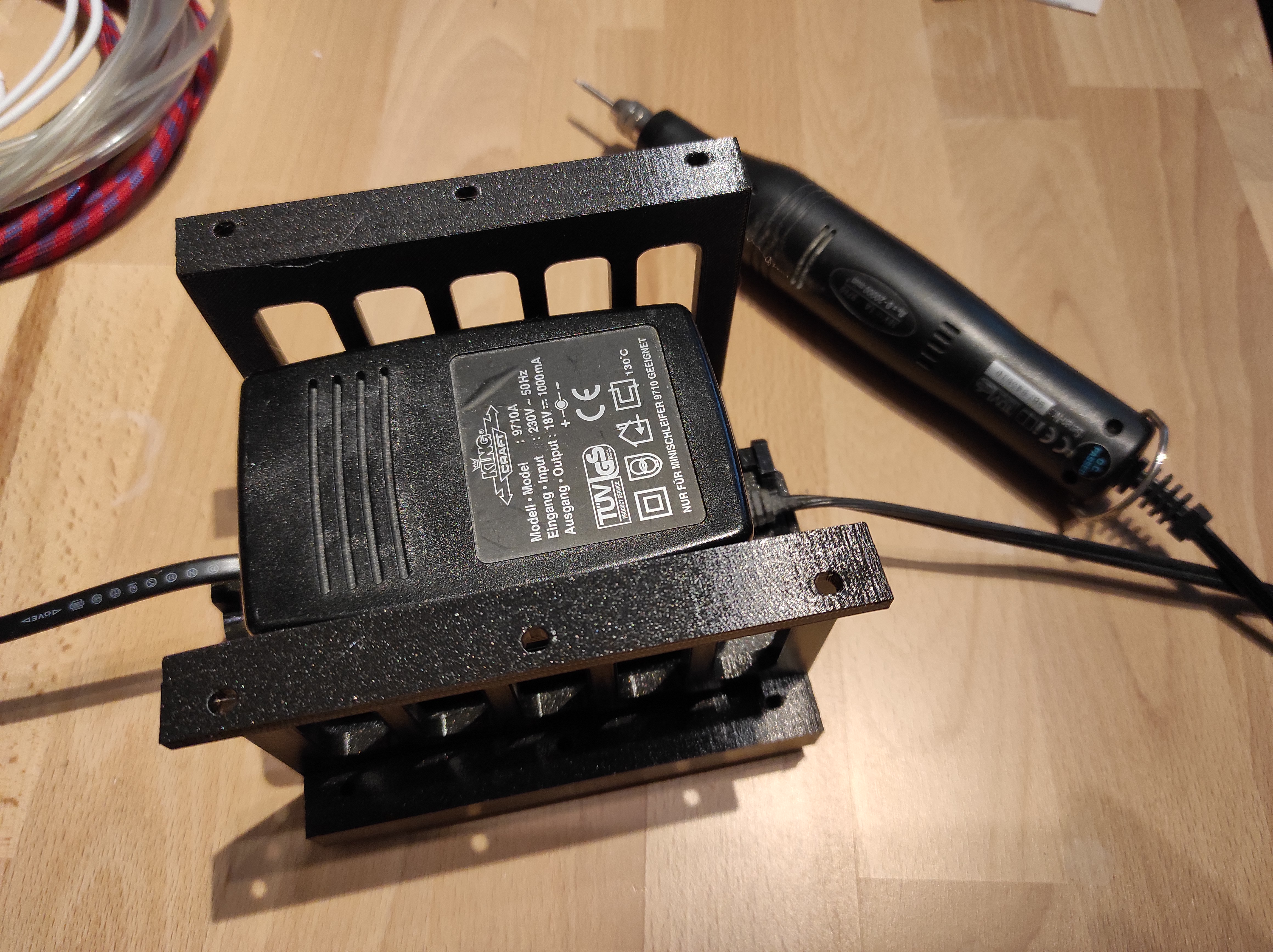 Handdrill power supply holder