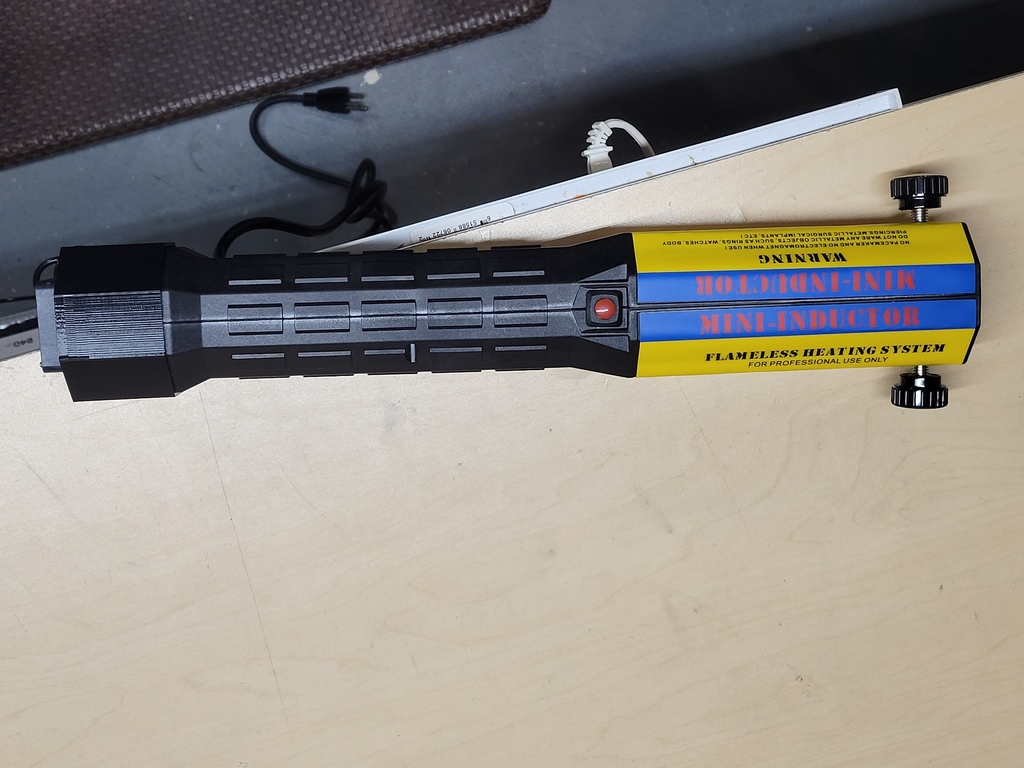 Magnetic induction bolt heater cooling fan