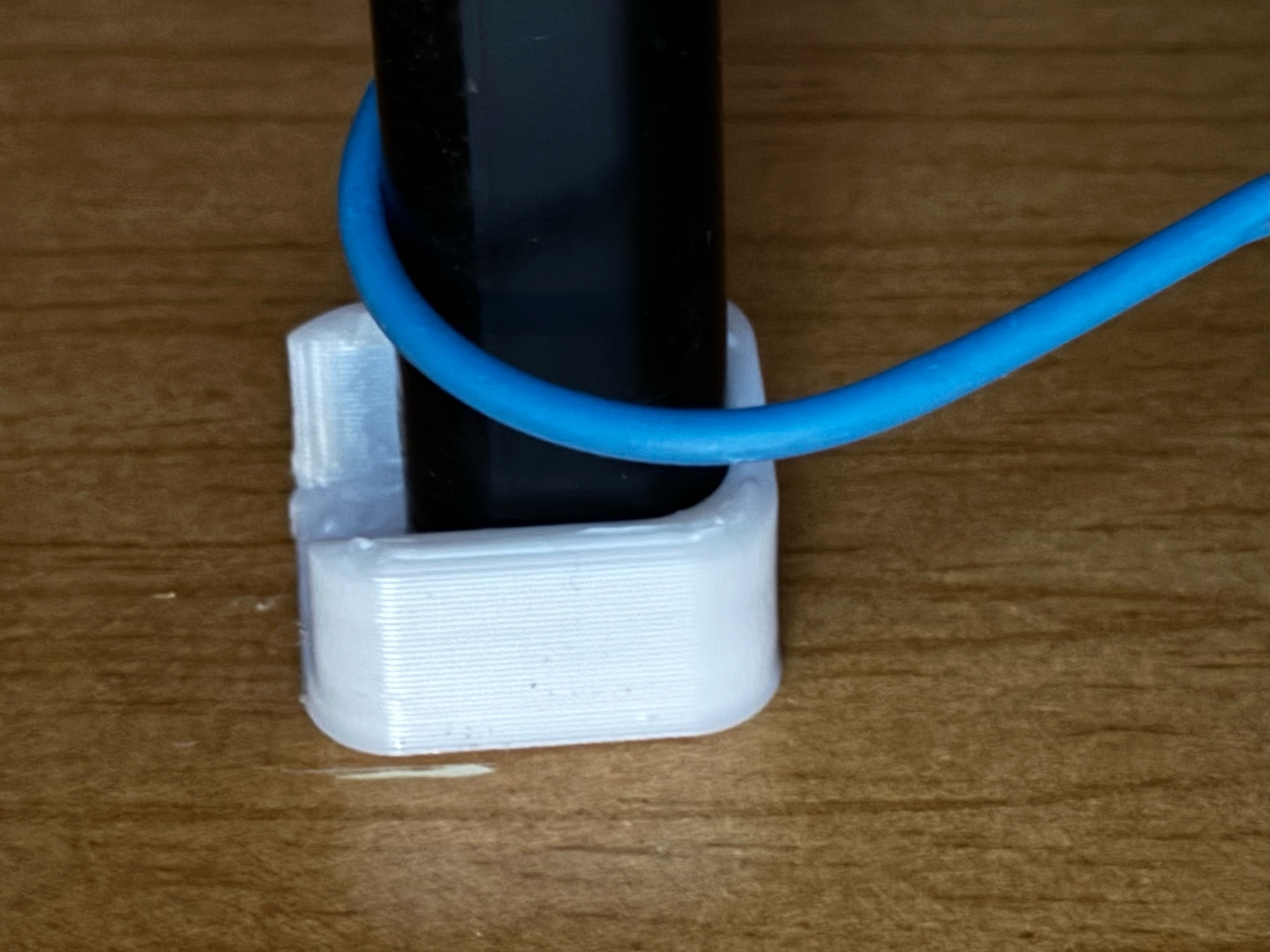 Soporte para barra de armario