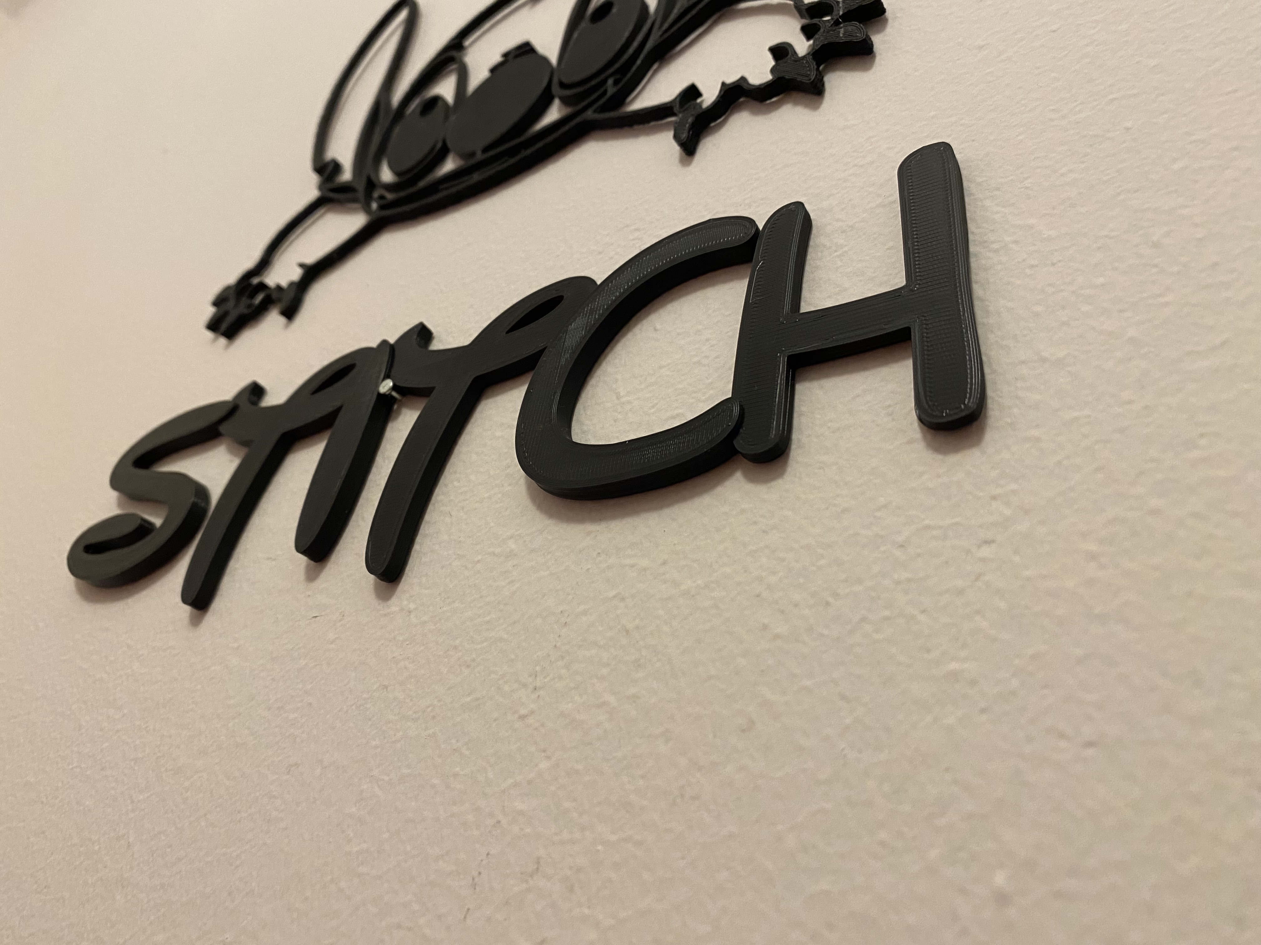 Stitch name wall badge