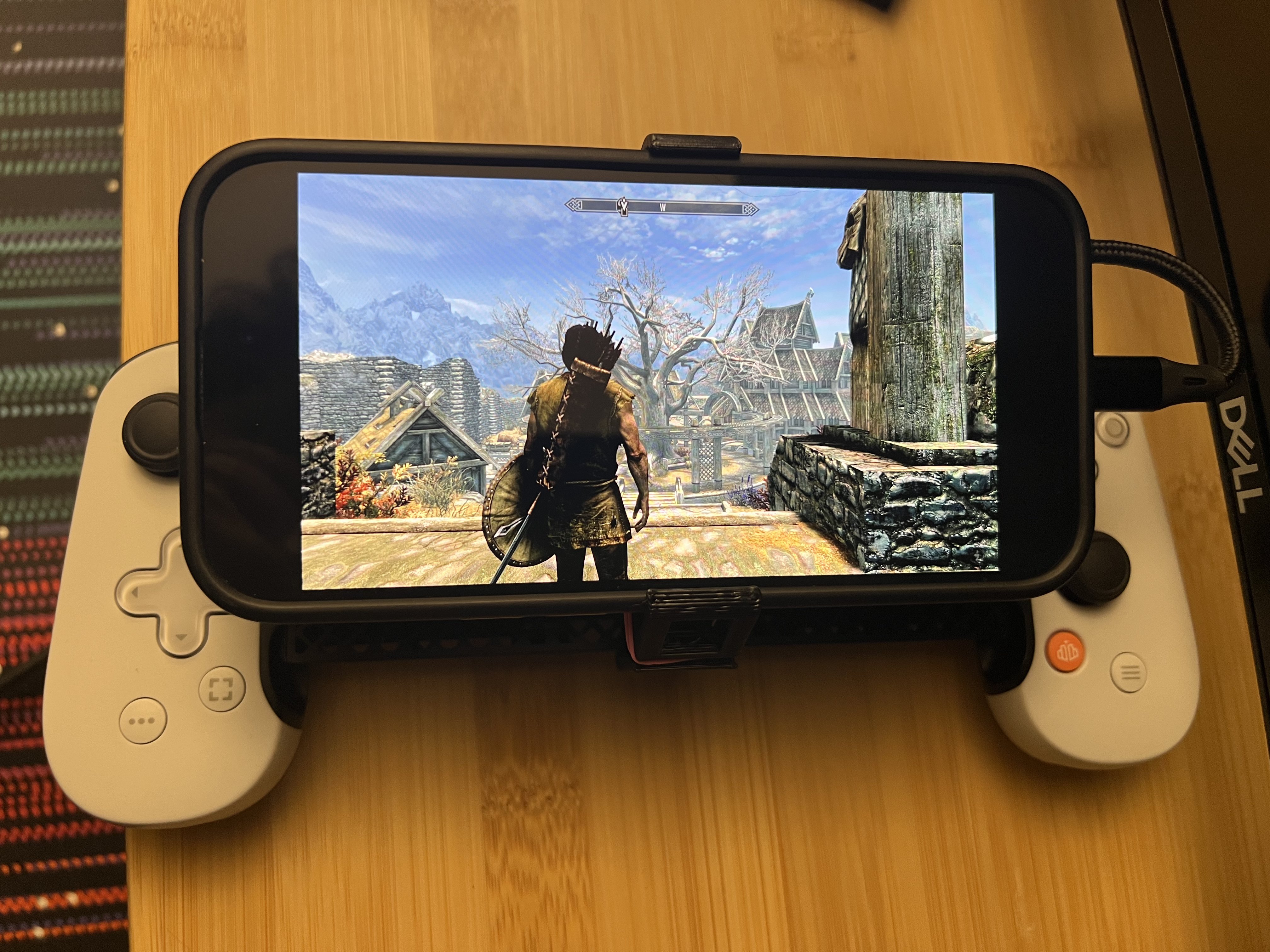 Backbone controller adapter for cased phones