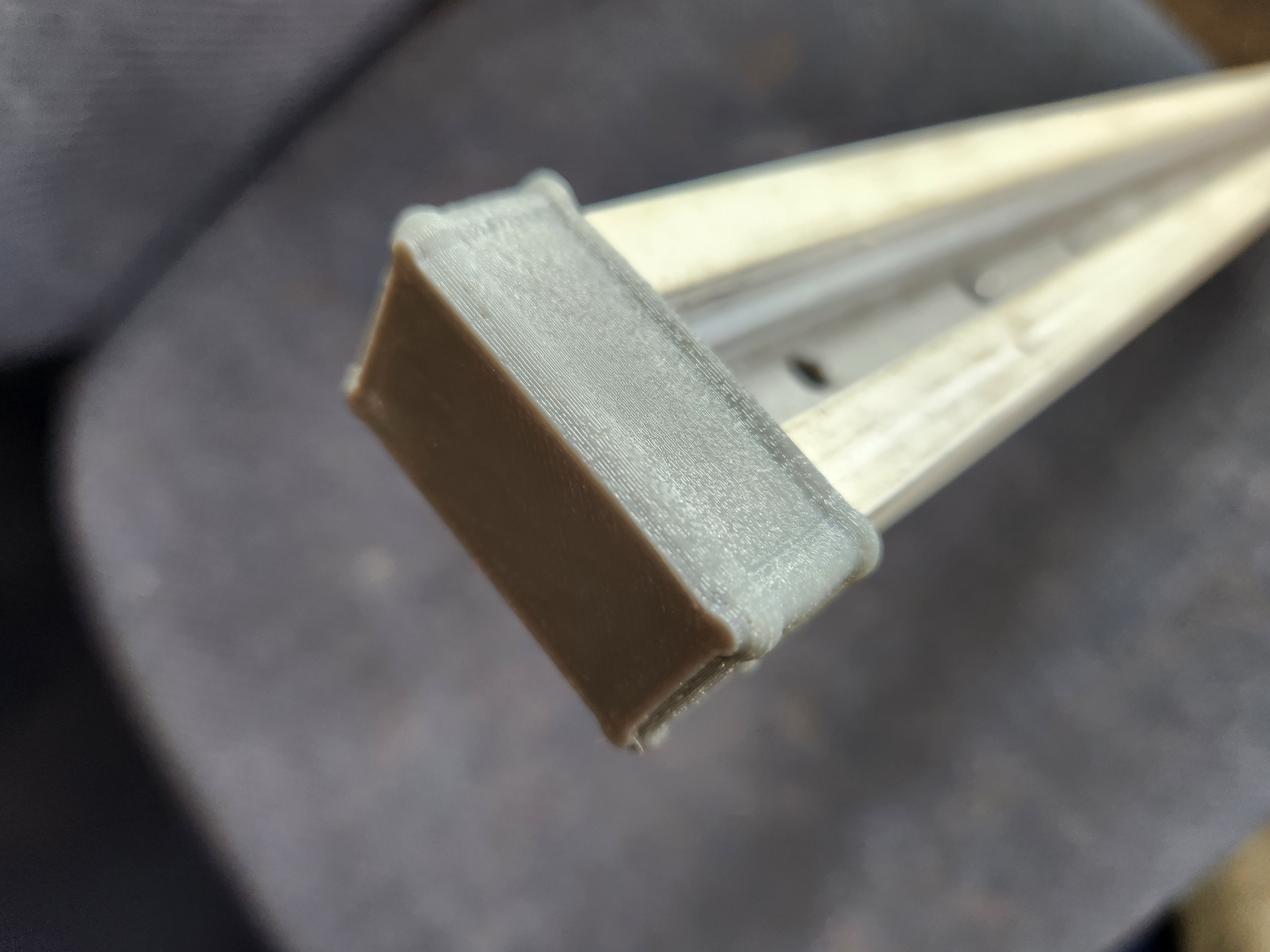 light track flexible end cap for transport