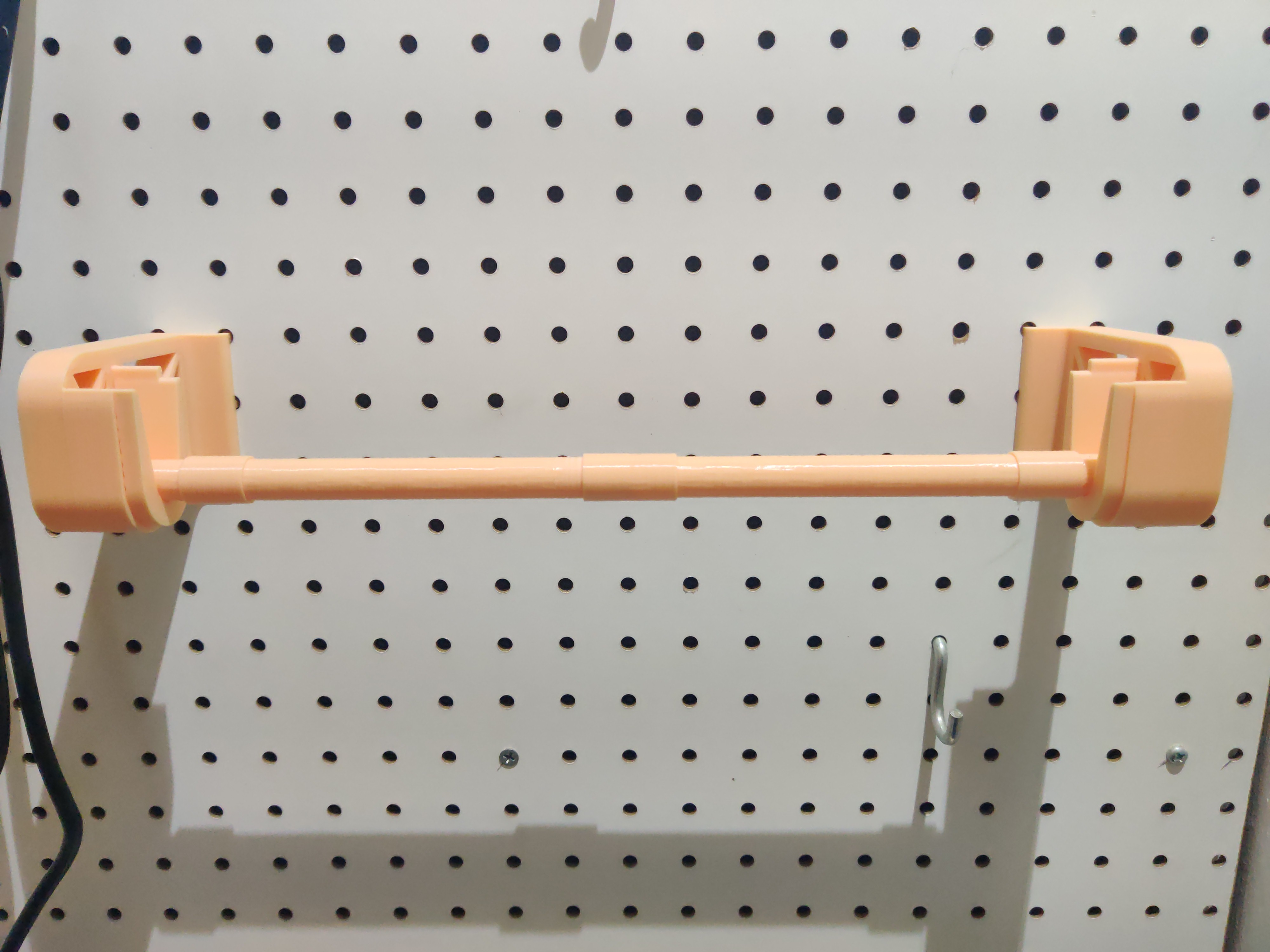 Pegboard paper towel dowel by Steve S. Download free STL model