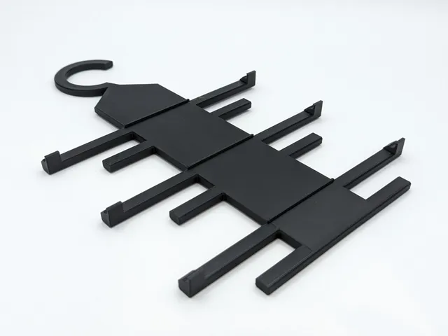 Tie and belt display rack