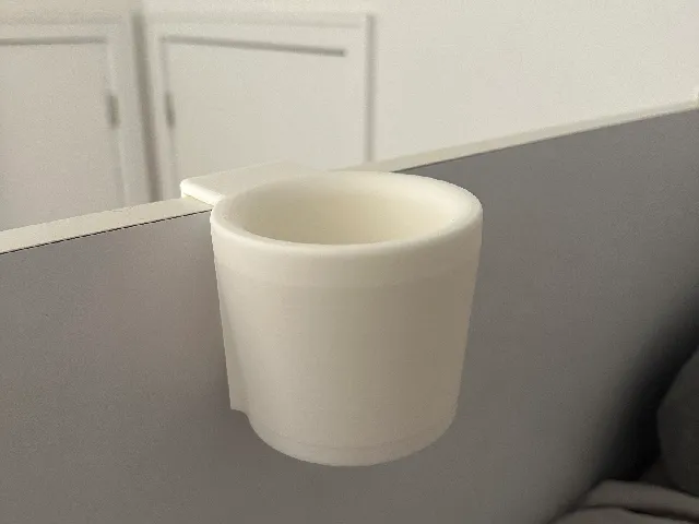 Rail-mounted cup holder