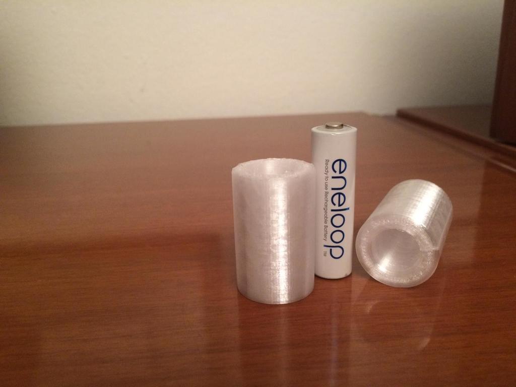 Battery adapter from torch AA to C useful for rechargeable