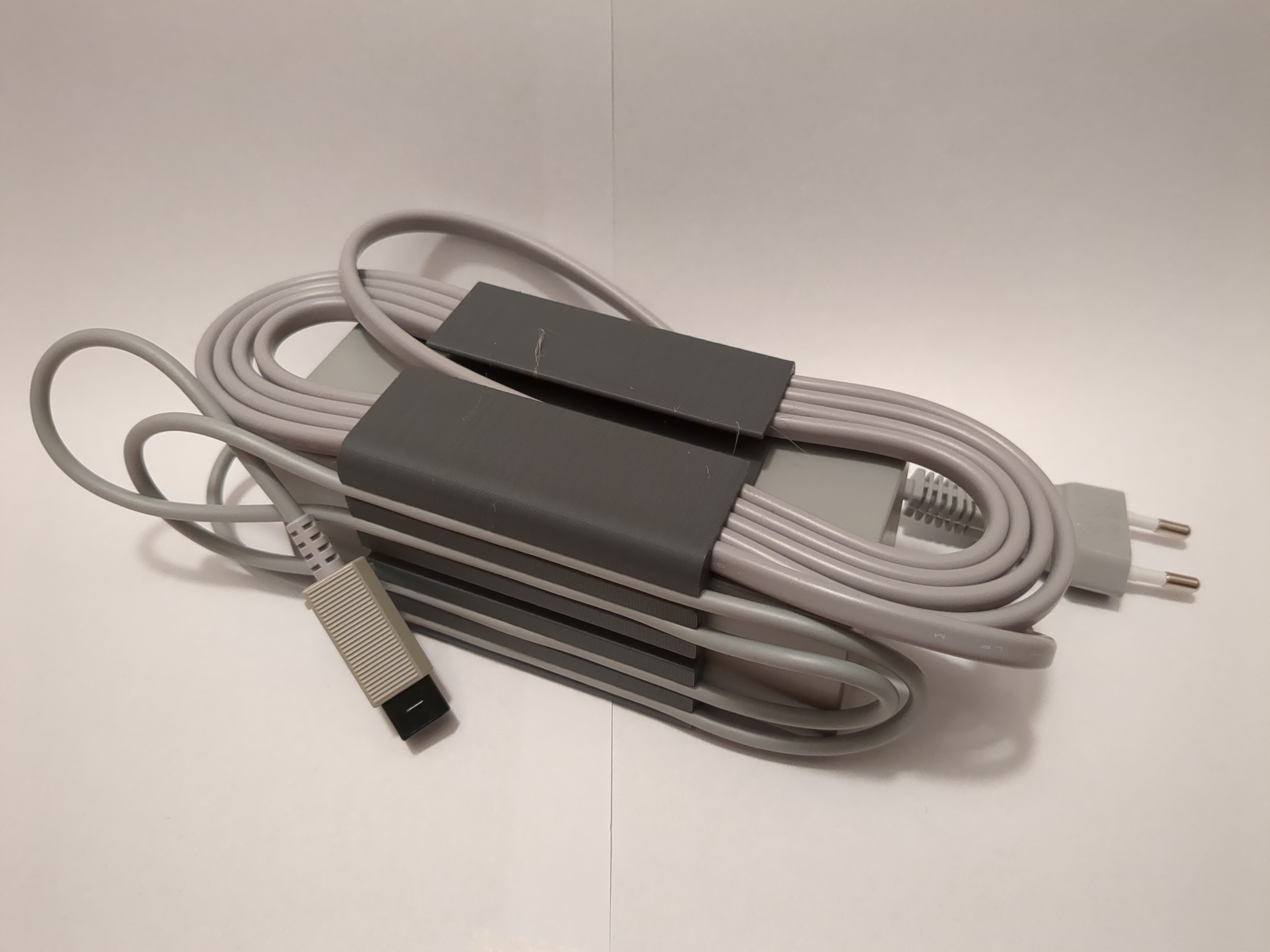 Cable management for Nintendo Wii PSU (EU and NA version)